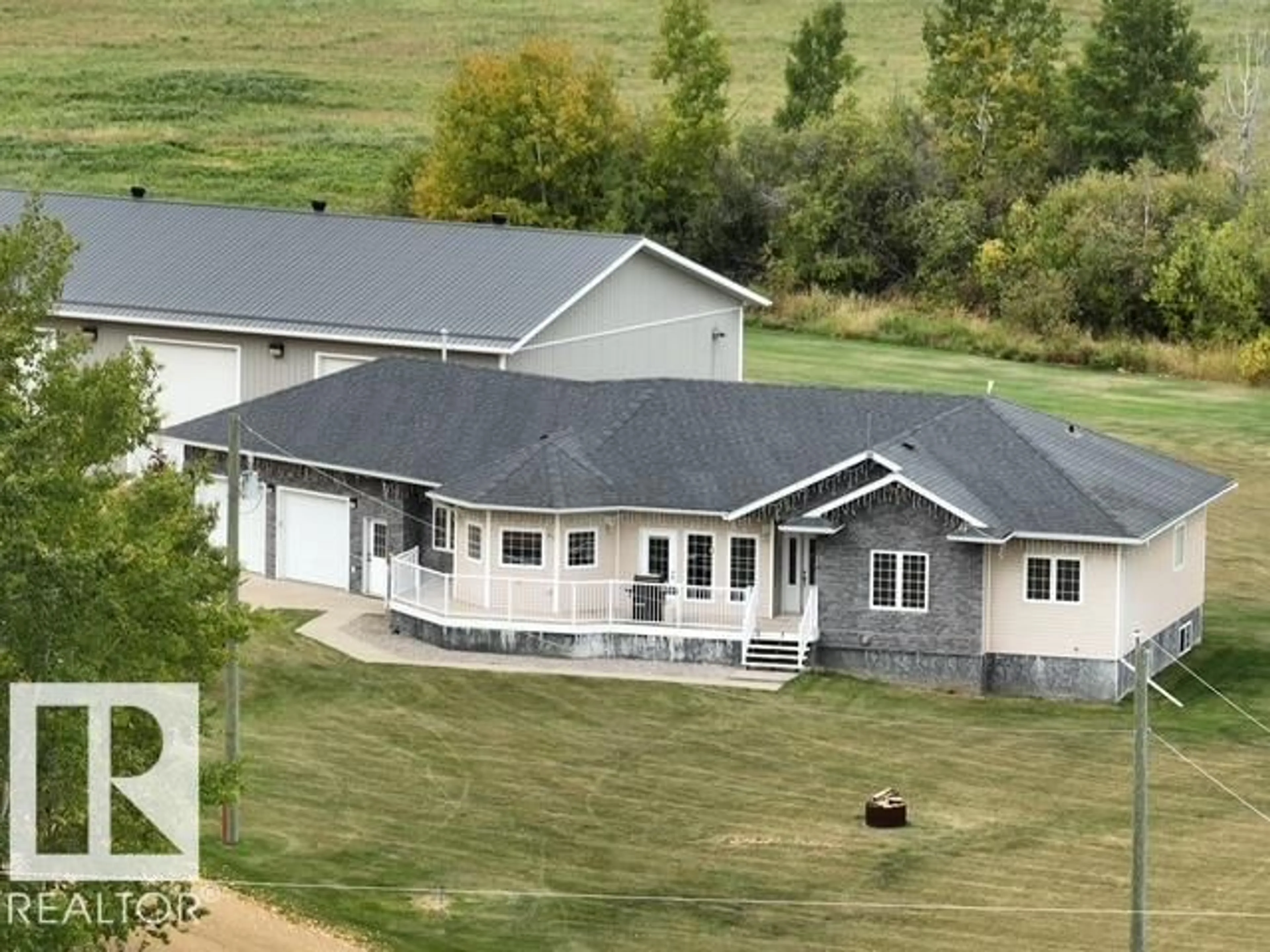 A pic from outside/outdoor area/front of a property/back of a property/a pic from drone, mountain view for 621032 RR 234, Rural Athabasca County Alberta T0G1Z0