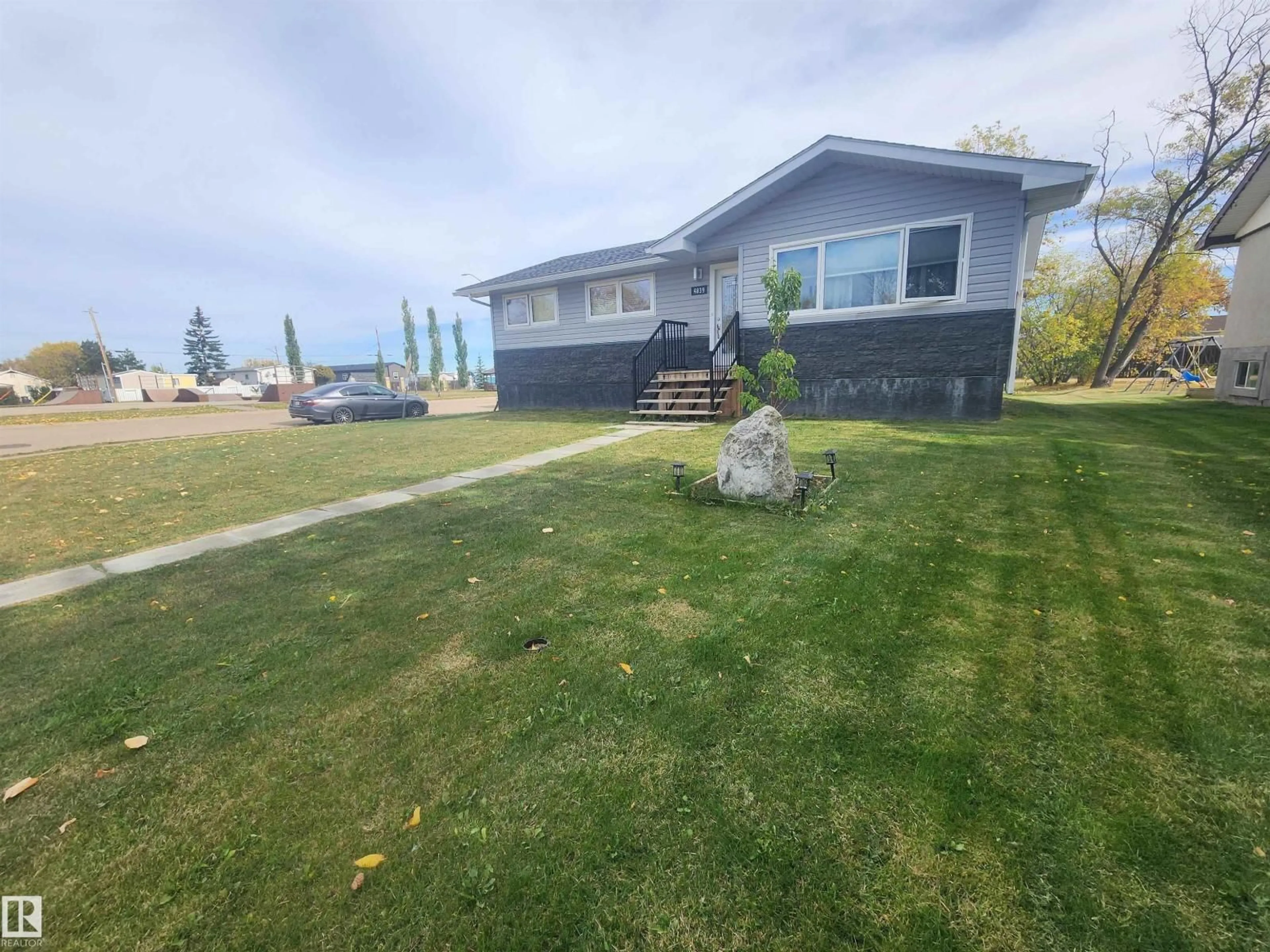 A pic from outside/outdoor area/front of a property/back of a property/a pic from drone, water/lake/river/ocean view for 4839 49 ST, Clyde Alberta T0G0P0