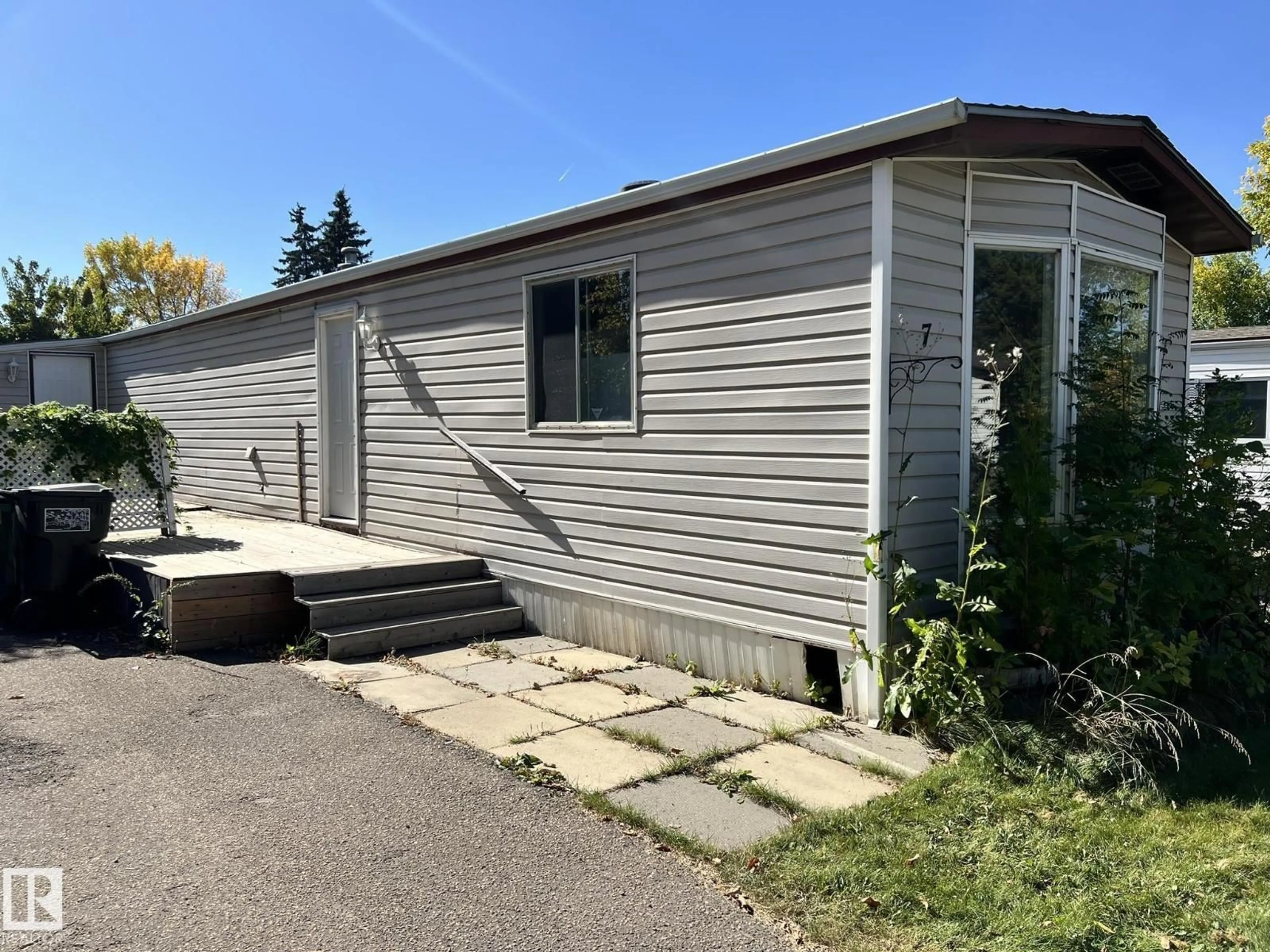 Home with vinyl exterior material, street for 7 HILLCREST DR, Edmonton Alberta T6P1J1