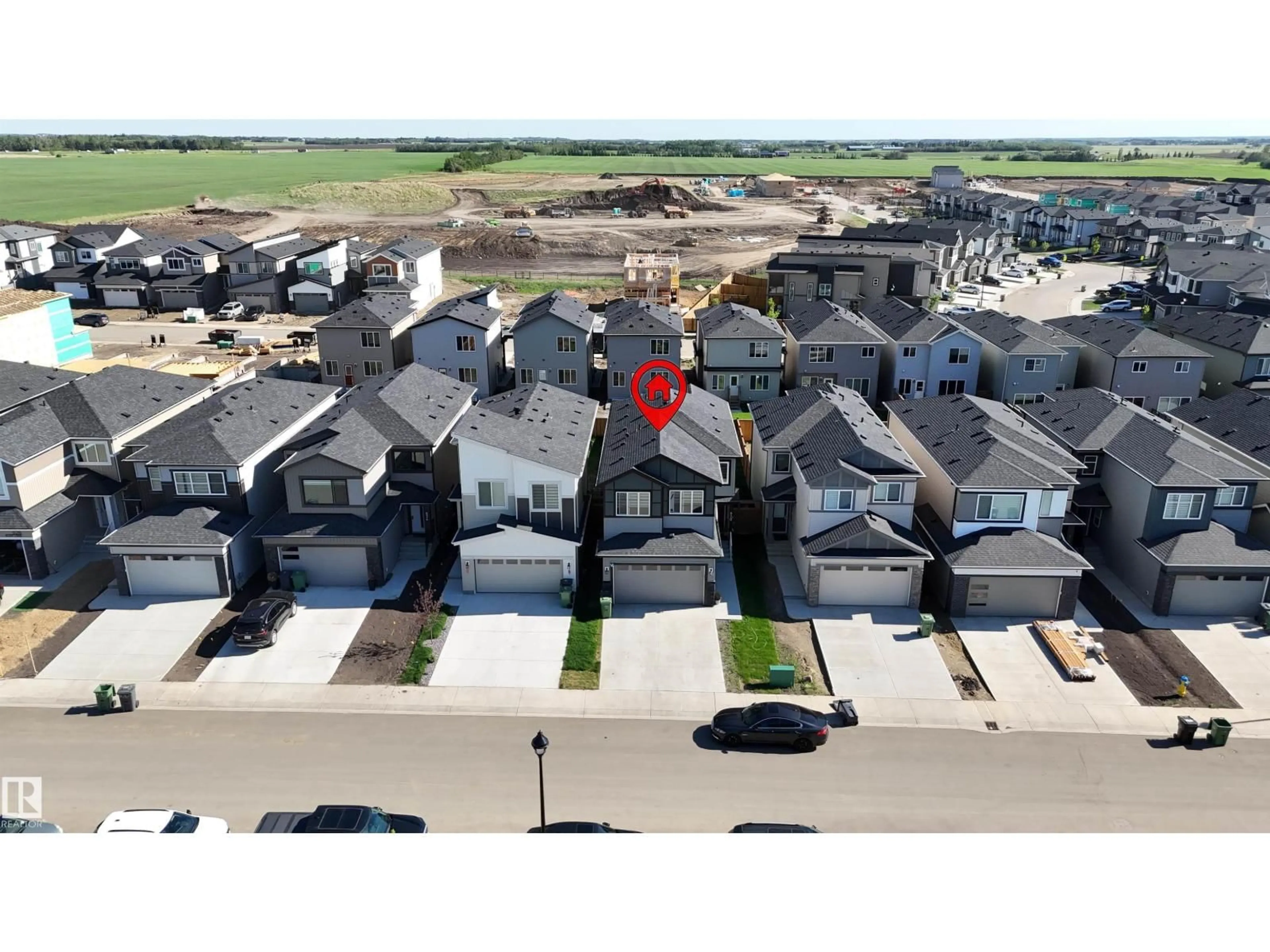 A pic from outside/outdoor area/front of a property/back of a property/a pic from drone, street for 520 BLUFF LN, Leduc Alberta T9E1R5