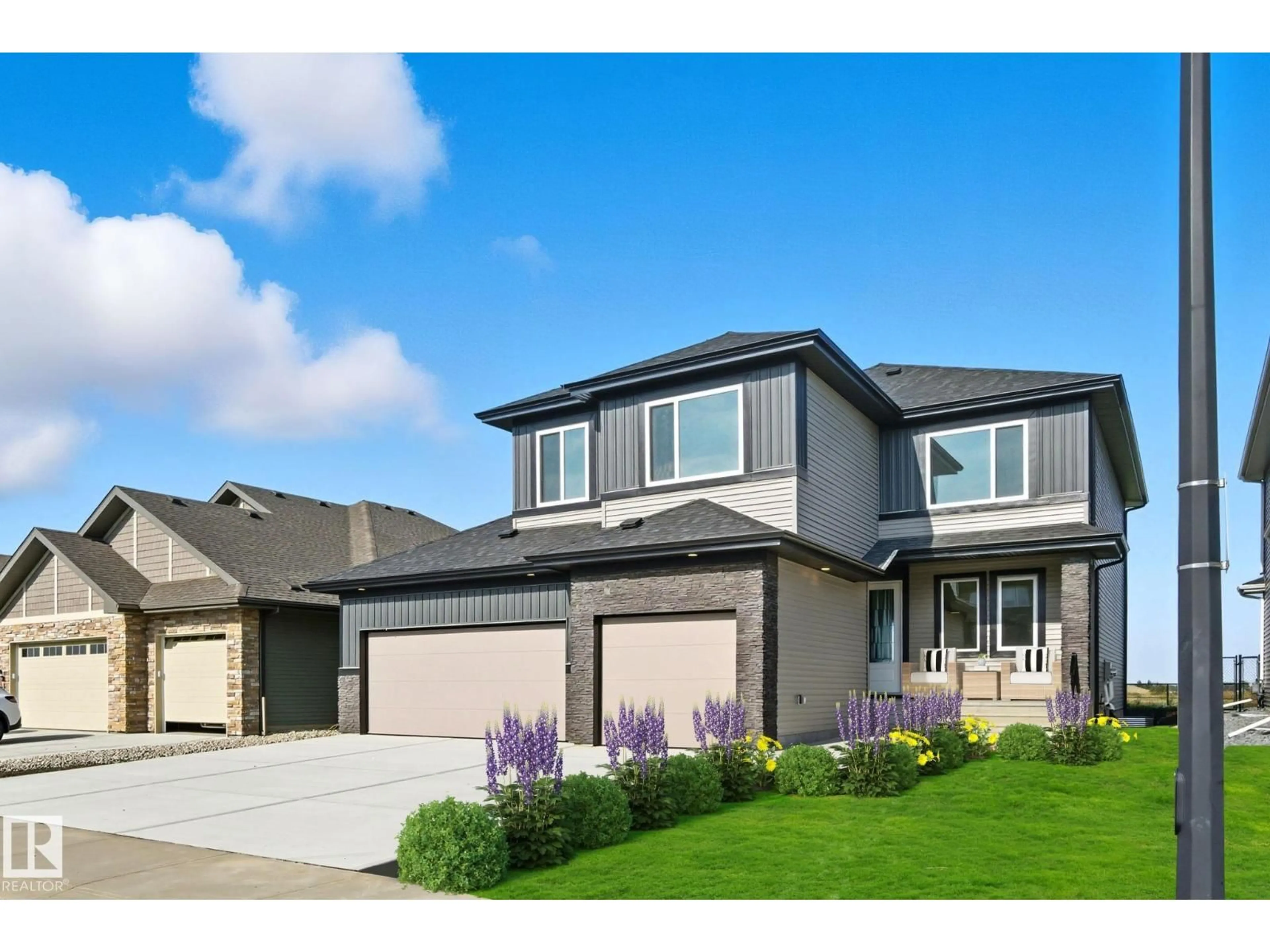 Home with vinyl exterior material, street for 2006 GENESIS LN, Stony Plain Alberta T7Z0G3