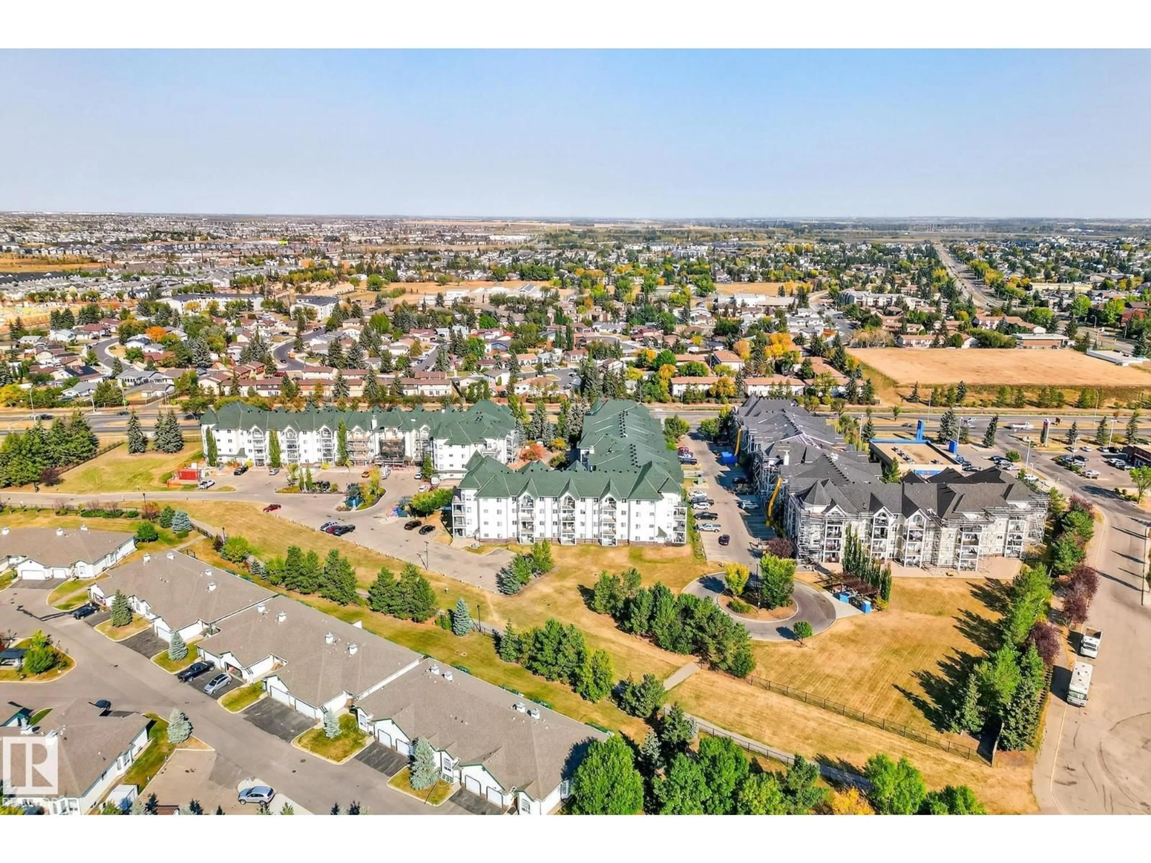 A pic from outside/outdoor area/front of a property/back of a property/a pic from drone, mountain view for #303 - 13625 34 ST, Edmonton Alberta T5A0E3