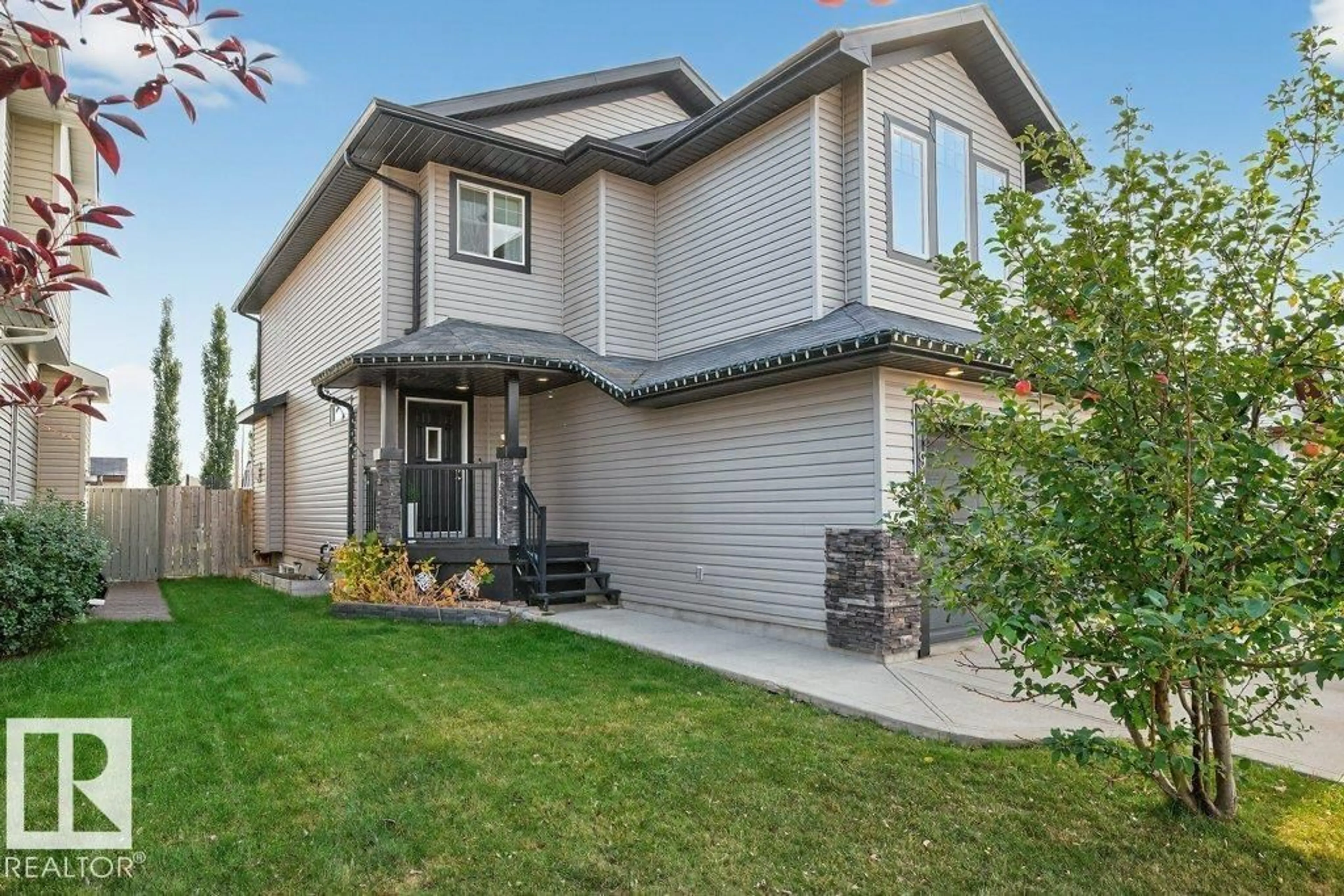 Home with brick exterior material, street for 9407 81 AV, Morinville Alberta T8R0A9
