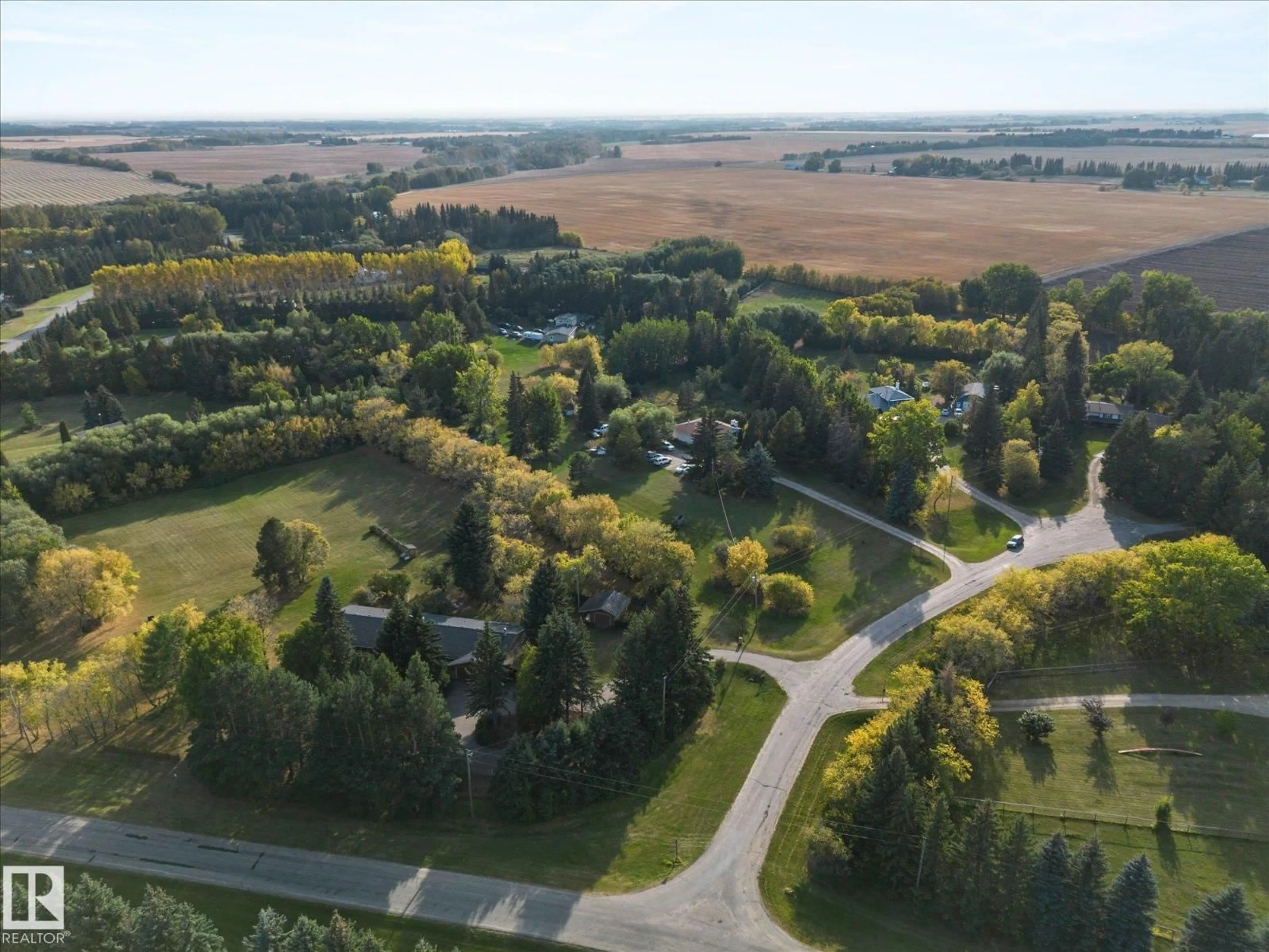 A pic from outside/outdoor area/front of a property/back of a property/a pic from drone, street for 46 52224 RGE ROAD 275, Rural Parkland County Alberta T7Y2V7