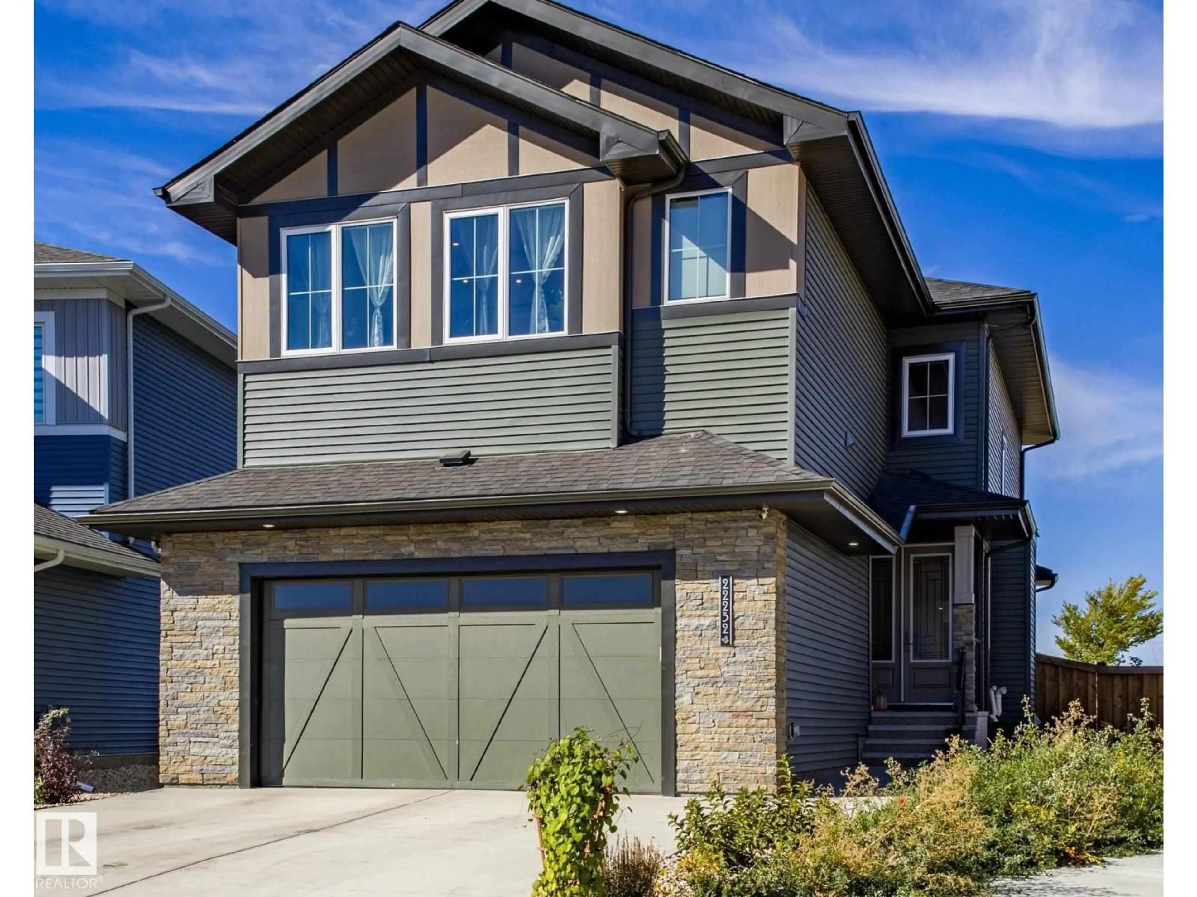 Home with vinyl exterior material, street for 22232 82 AV, Edmonton Alberta T5T7L2