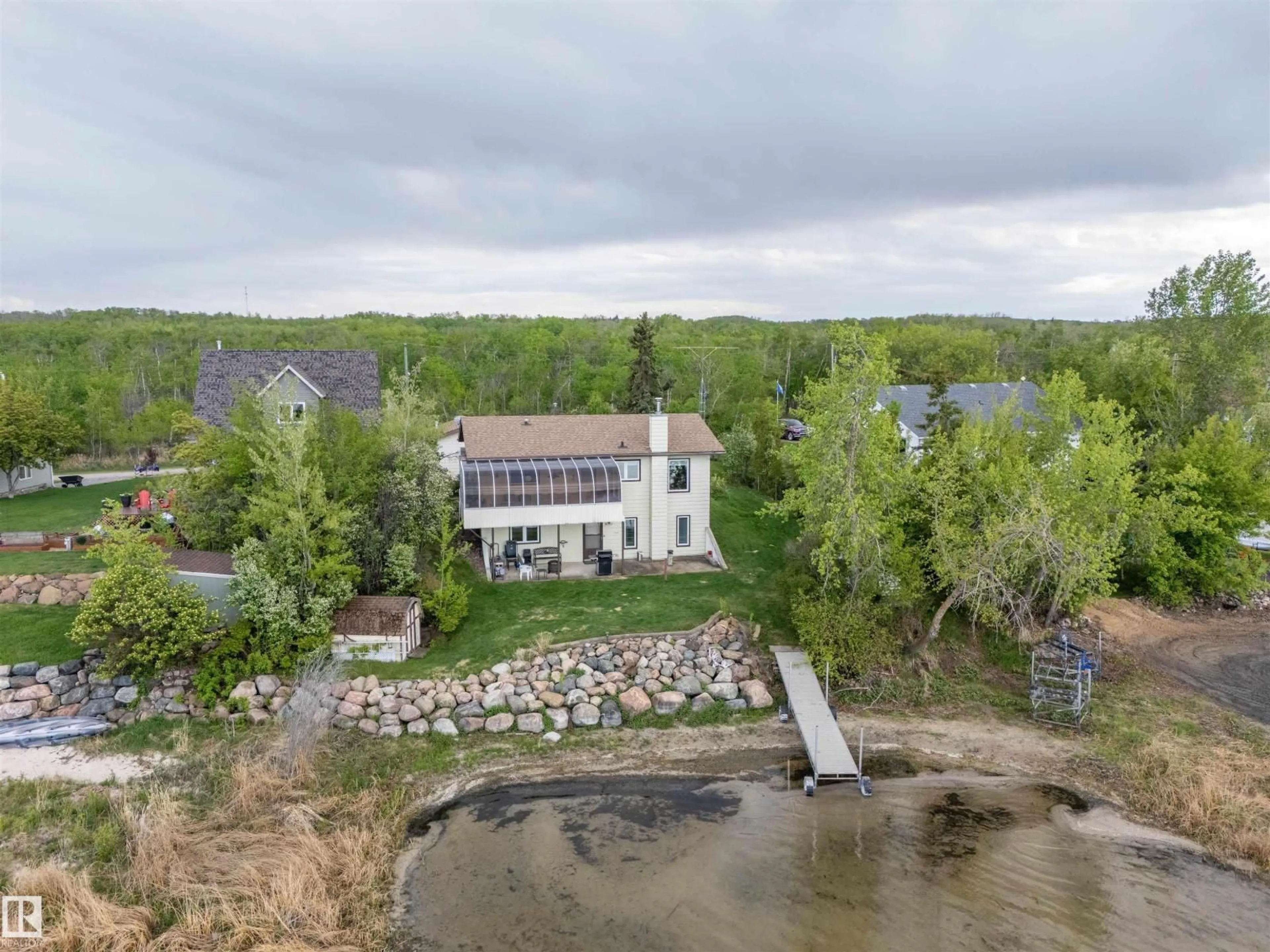 A pic from outside/outdoor area/front of a property/back of a property/a pic from drone, water/lake/river/ocean view for 48 47018 TWP RD 604A, Rural Bonnyville M.D. Alberta T9N2J3