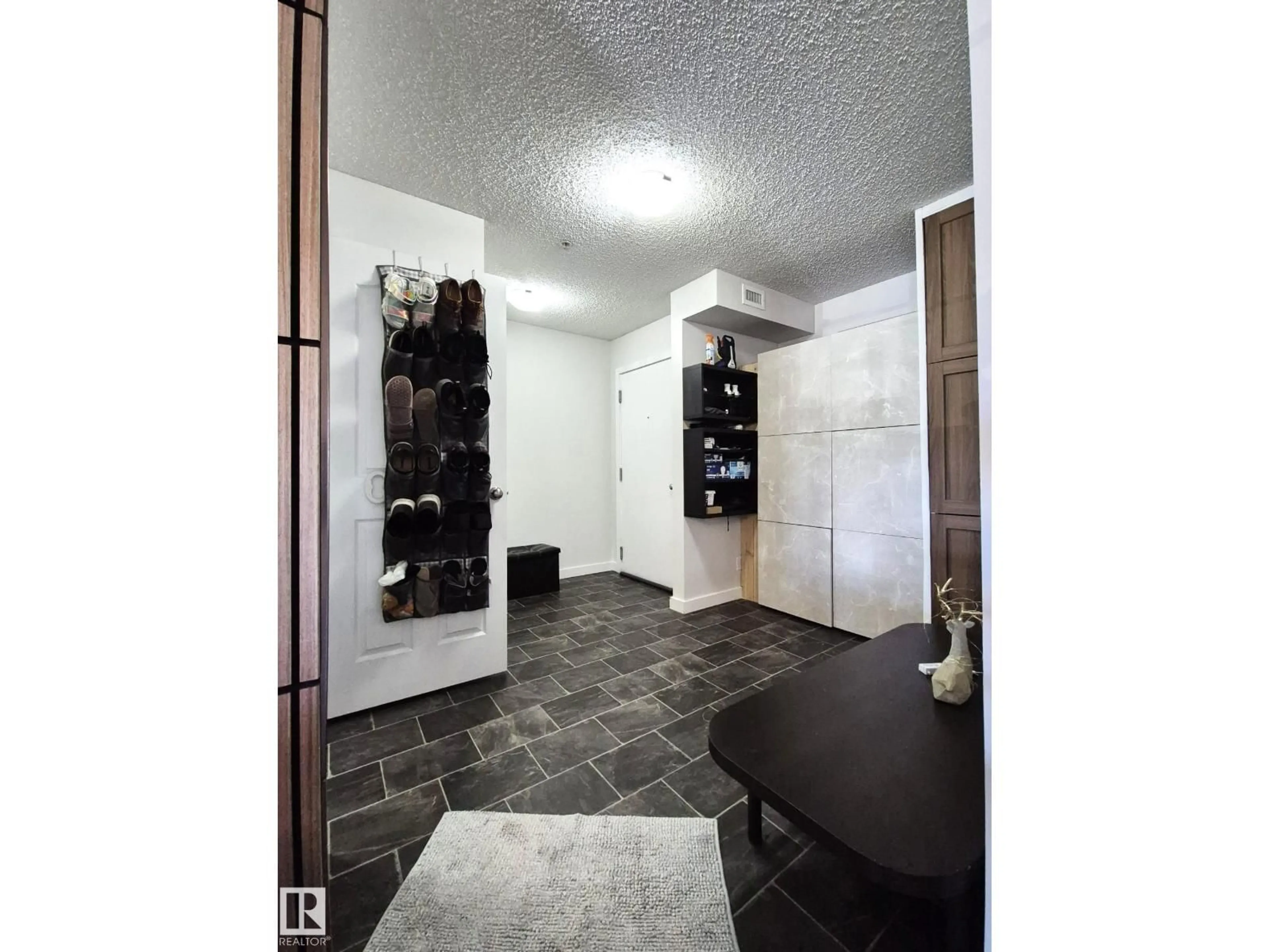 Indoor entryway for #223 - 12035 22 AV, Edmonton Alberta T6W2X9