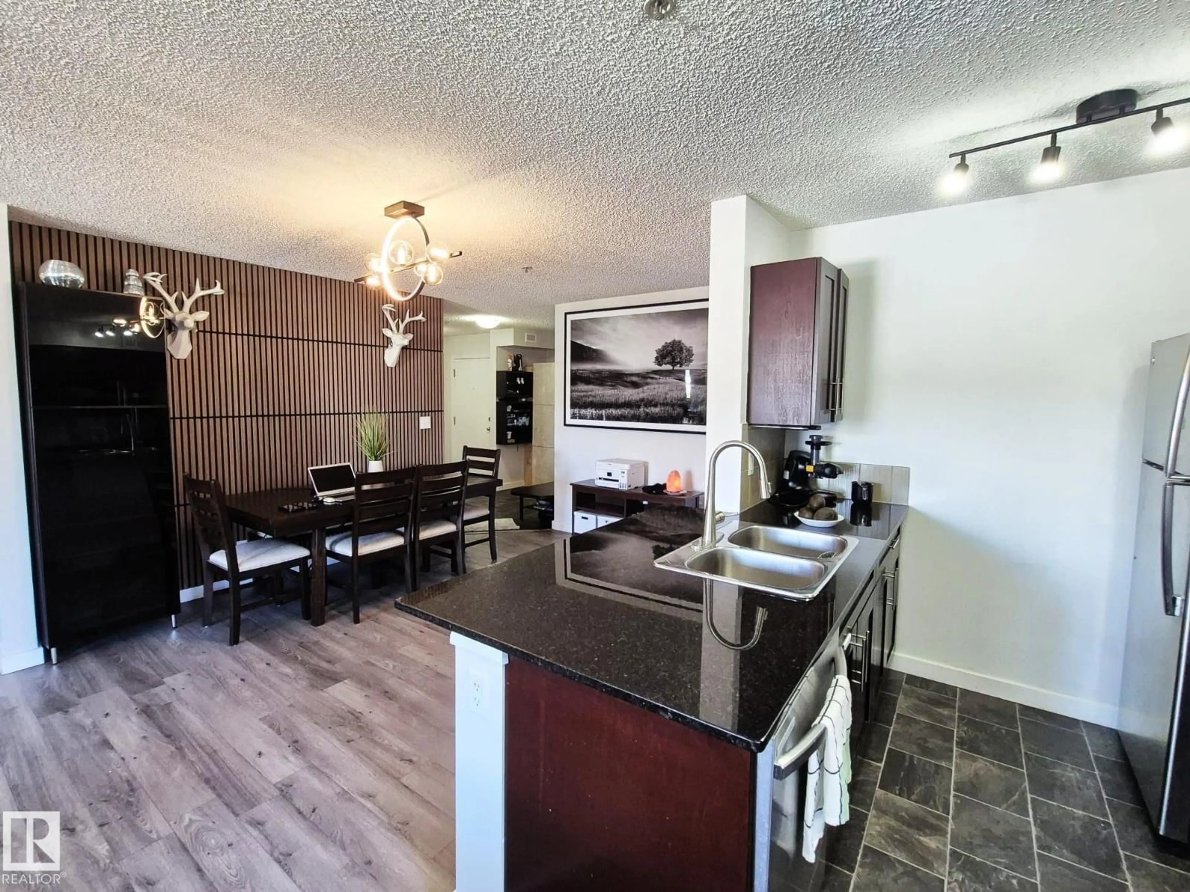 Open concept kitchen, unknown for #223 - 12035 22 AV, Edmonton Alberta T6W2X9