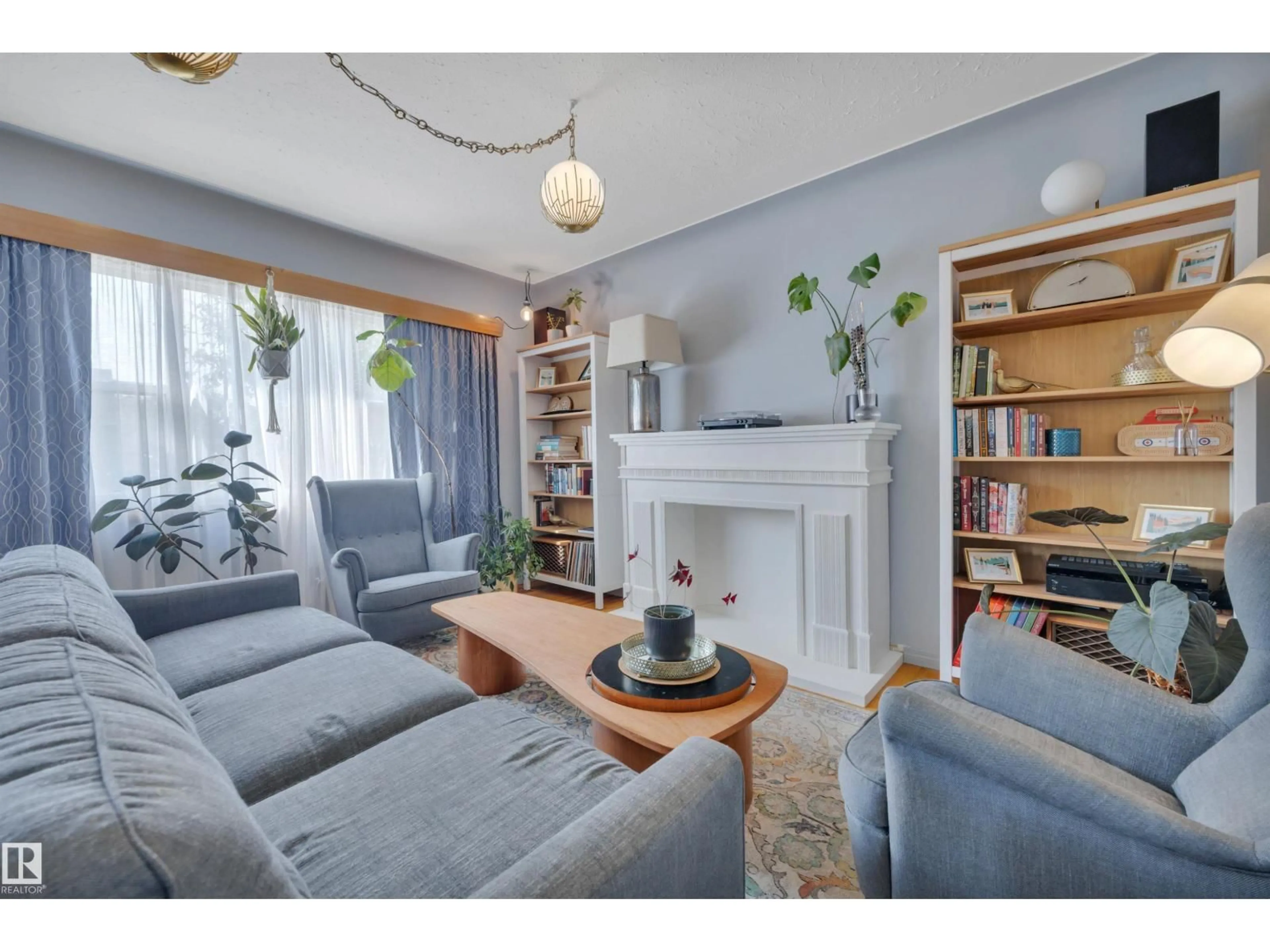 Living room with furniture, unknown for 11163 118 ST, Edmonton Alberta T5G2W8