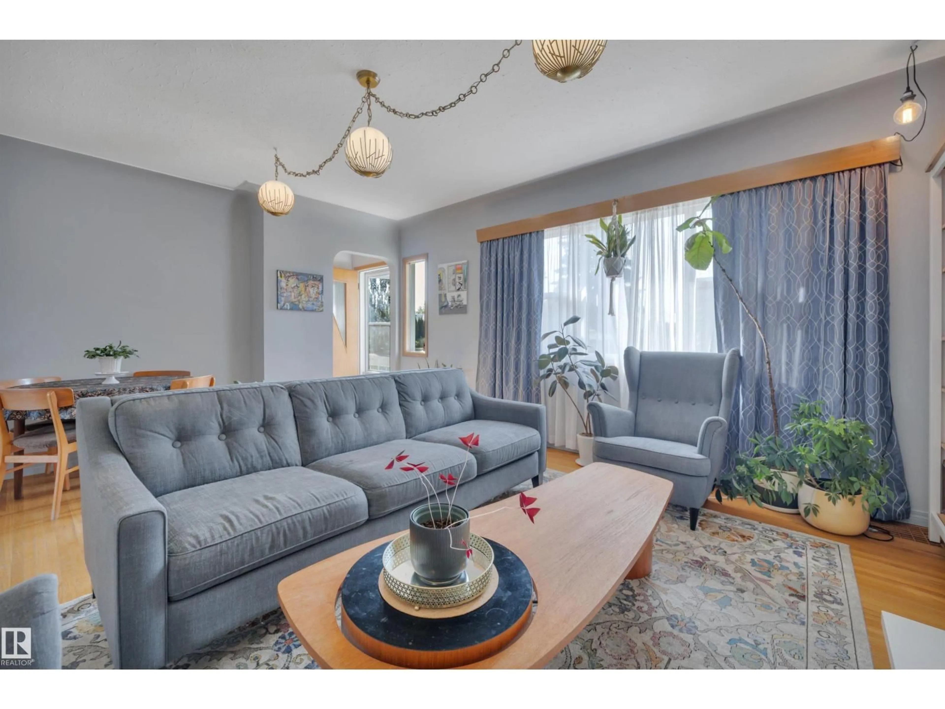 Living room with furniture, unknown for 11163 118 ST, Edmonton Alberta T5G2W8