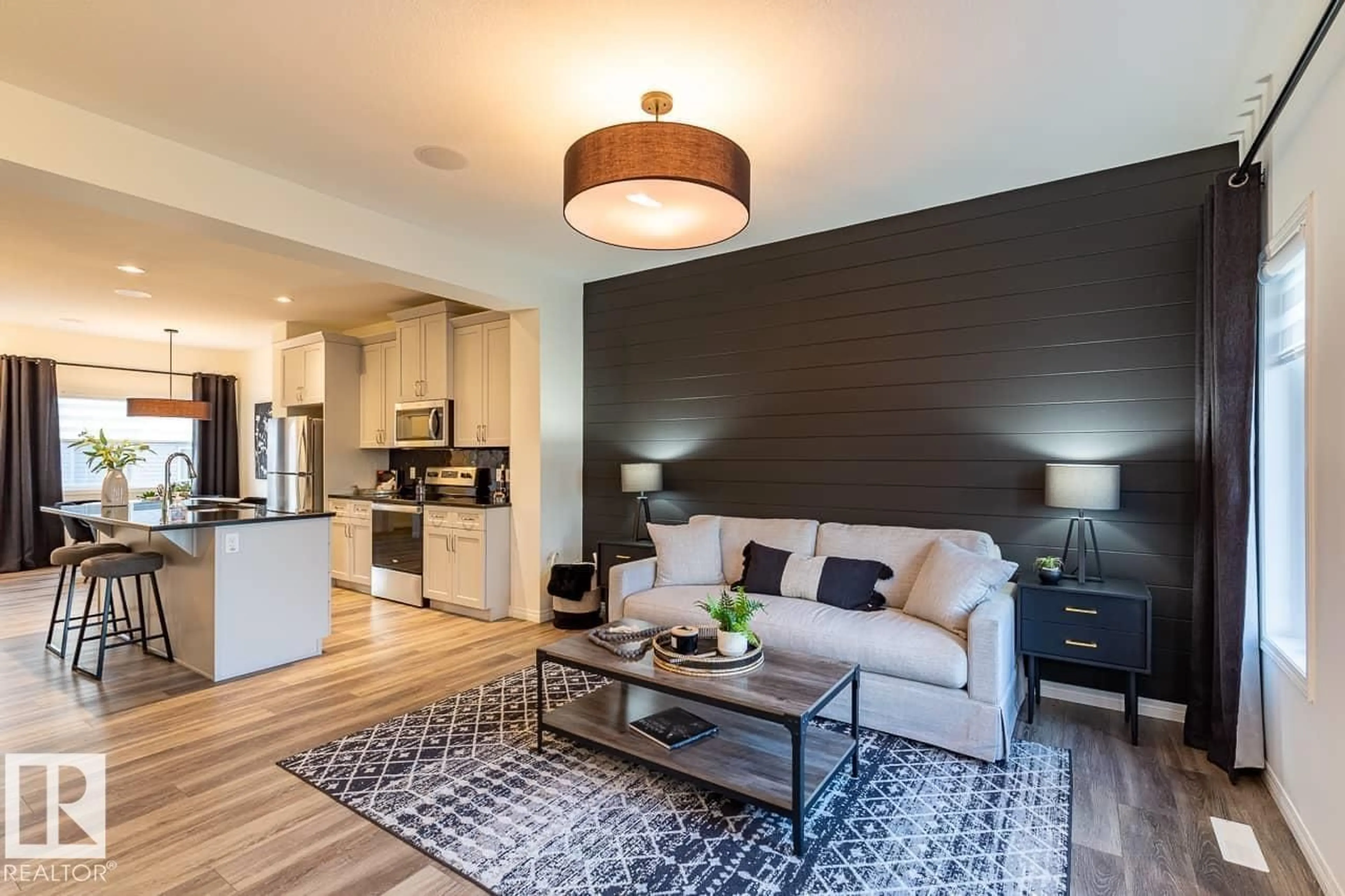 Living room with furniture, wood/laminate floor for 3828 38 ST, Beaumont Alberta T4X3B5