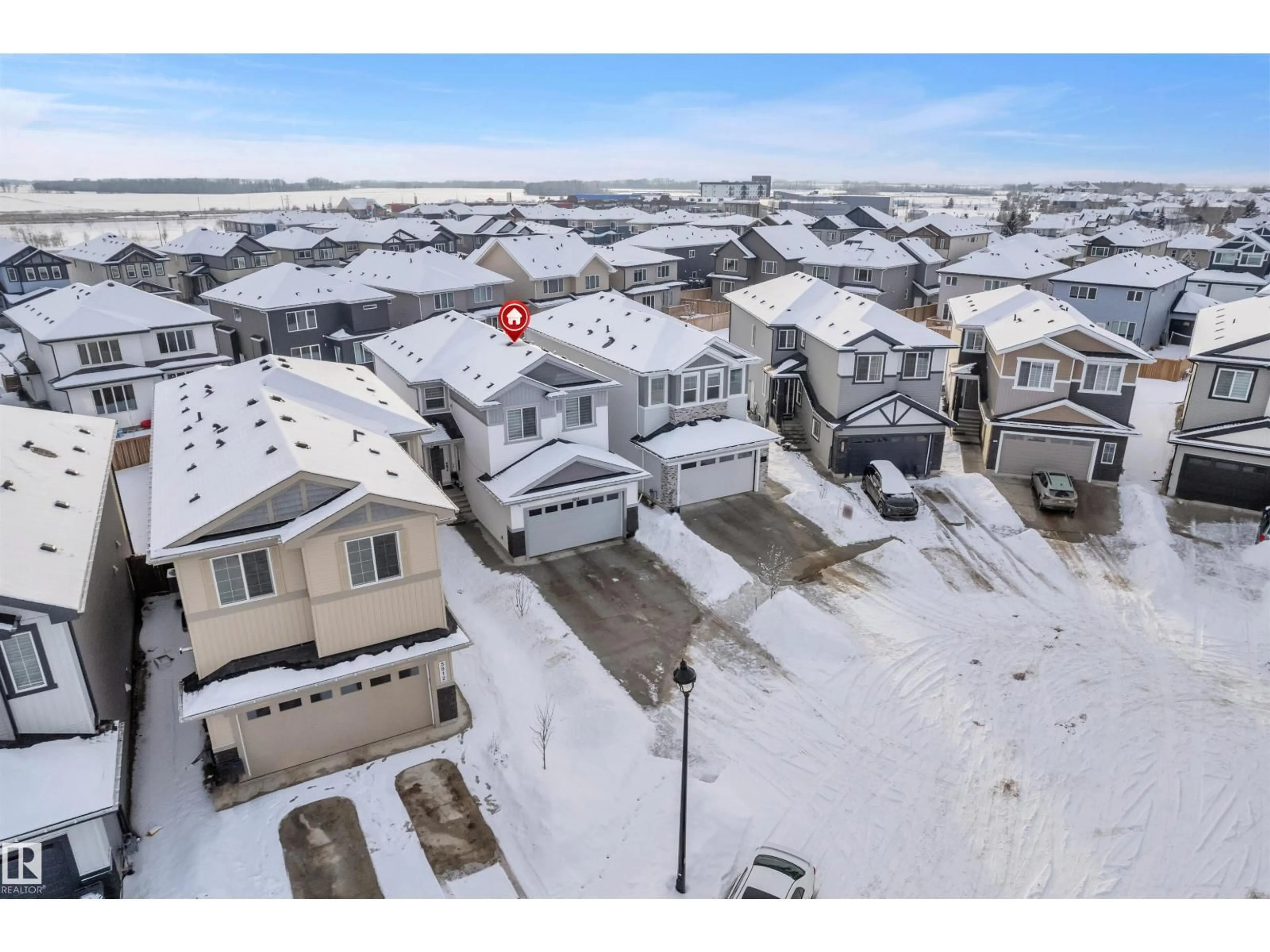 A pic from outside/outdoor area/front of a property/back of a property/a pic from drone, street for 5814 PELTIER CL, Beaumont Alberta T4X2Y1