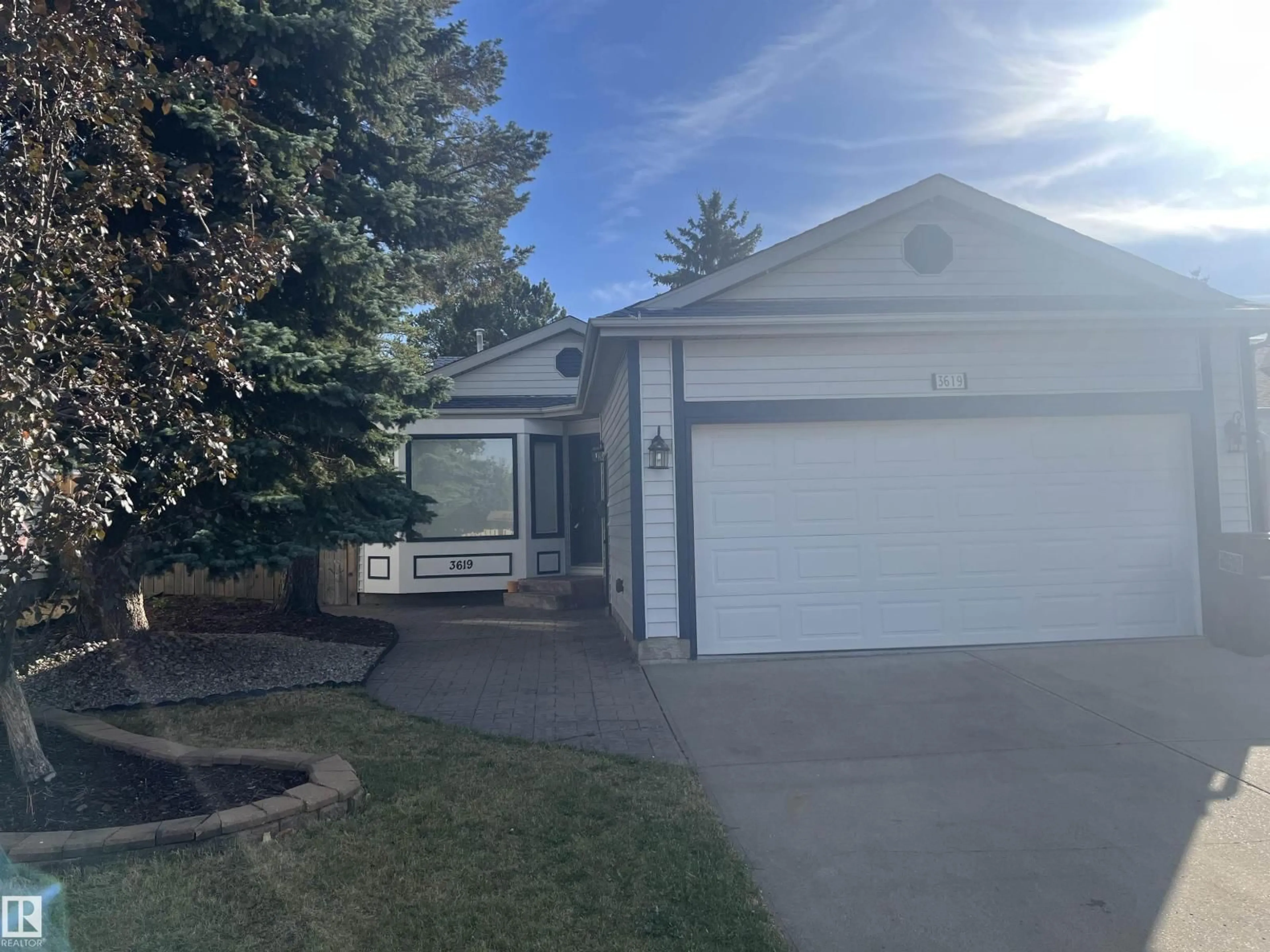 Home with vinyl exterior material, street for 3619 27 AV, Edmonton Alberta T6L6C5