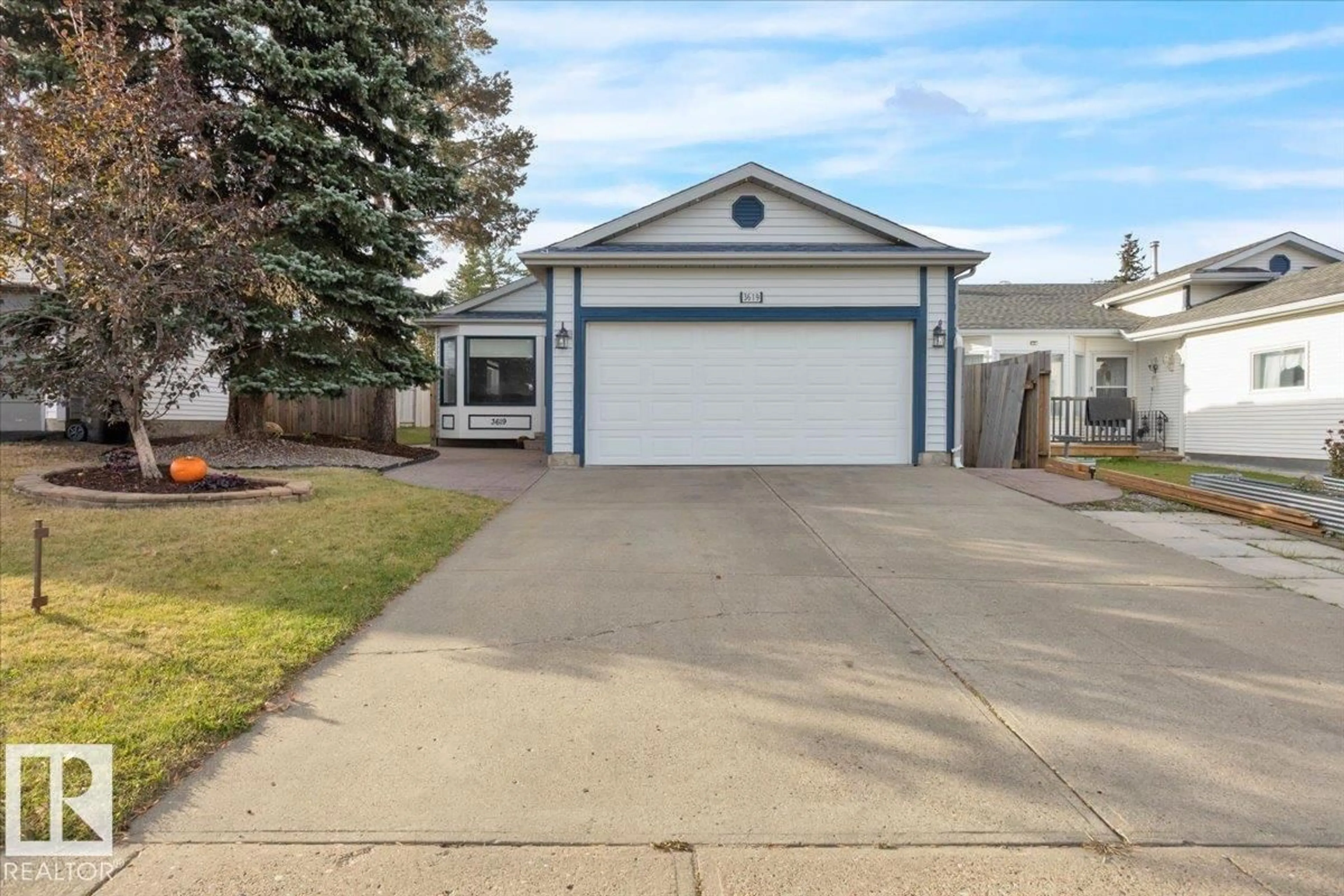 Home with vinyl exterior material, street for 3619 27 AV, Edmonton Alberta T6L6C5