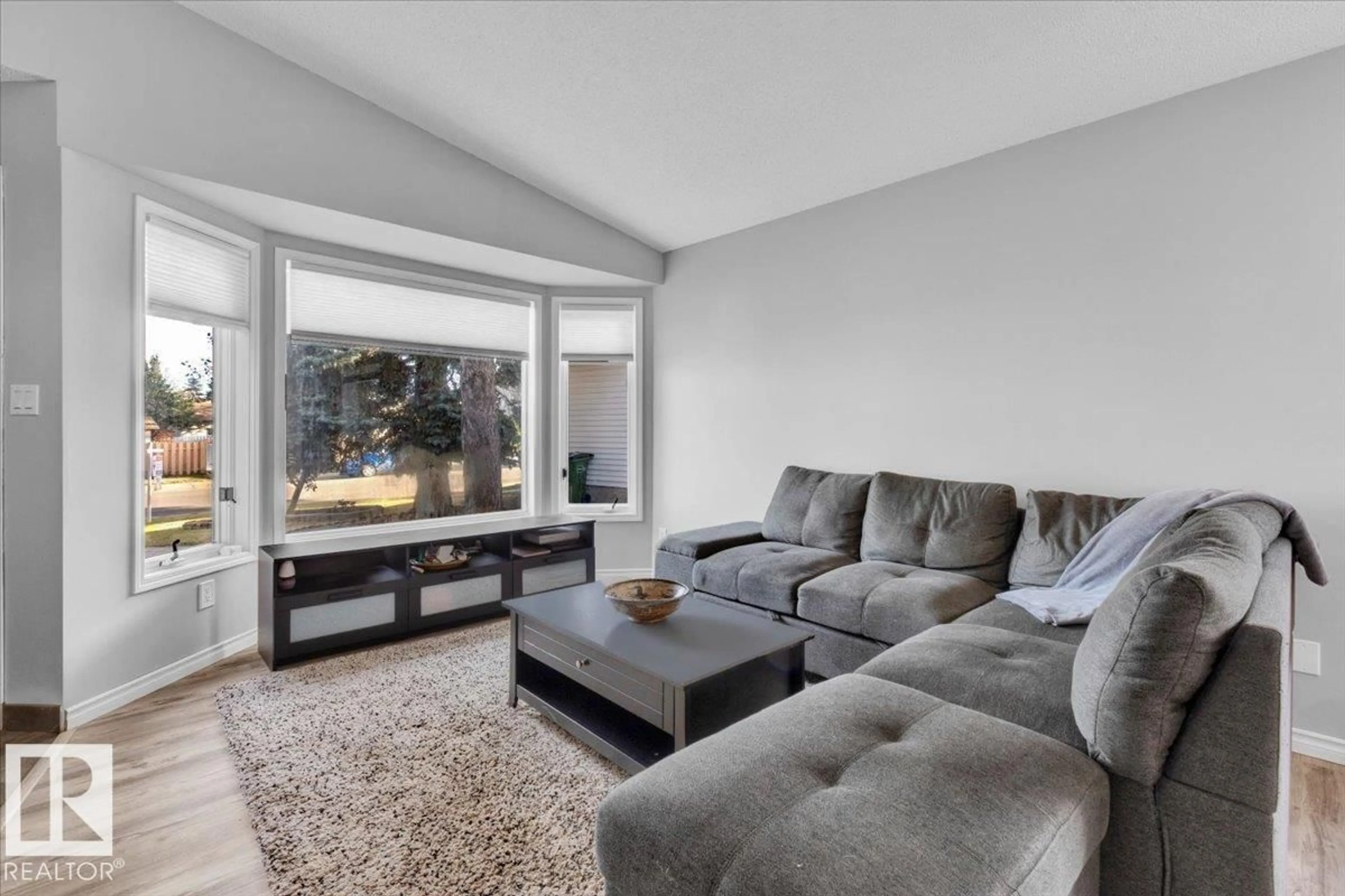 Living room with furniture, unknown for 3619 27 AV, Edmonton Alberta T6L6C5