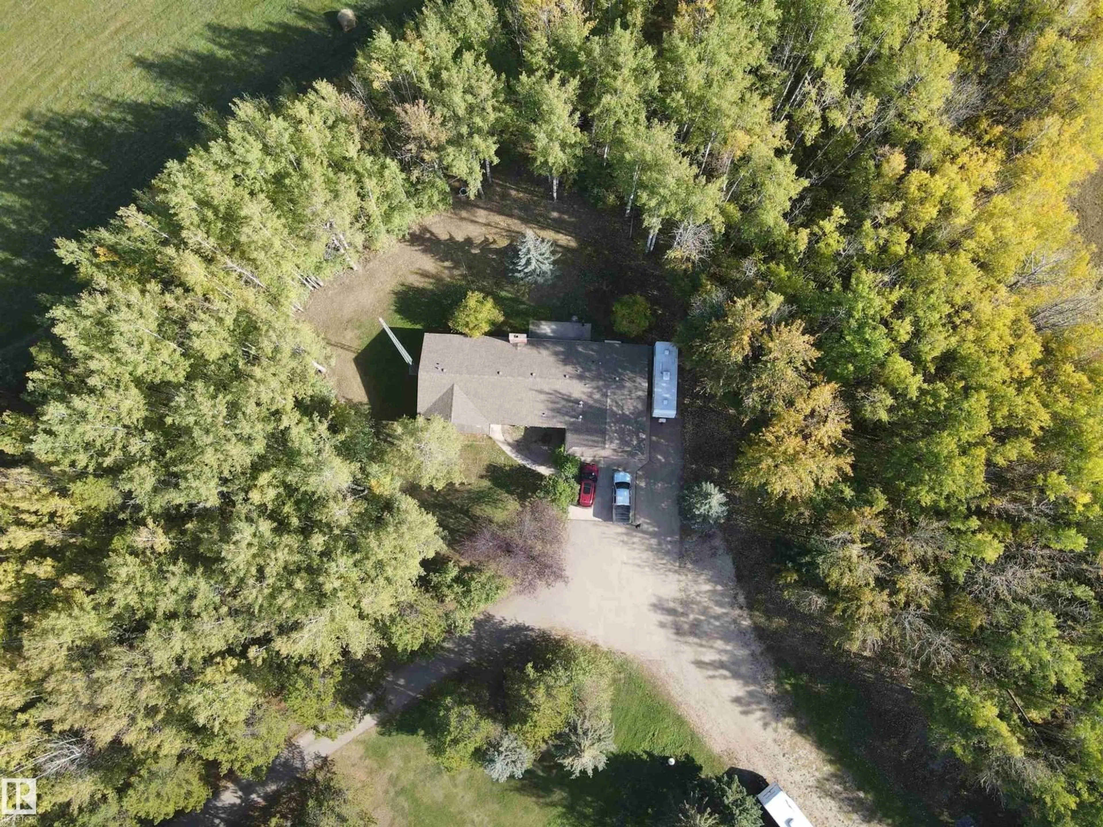A pic from outside/outdoor area/front of a property/back of a property/a pic from drone, forest/trees view for 5001 67 ST, Rural Brazeau County Alberta T7A1R9