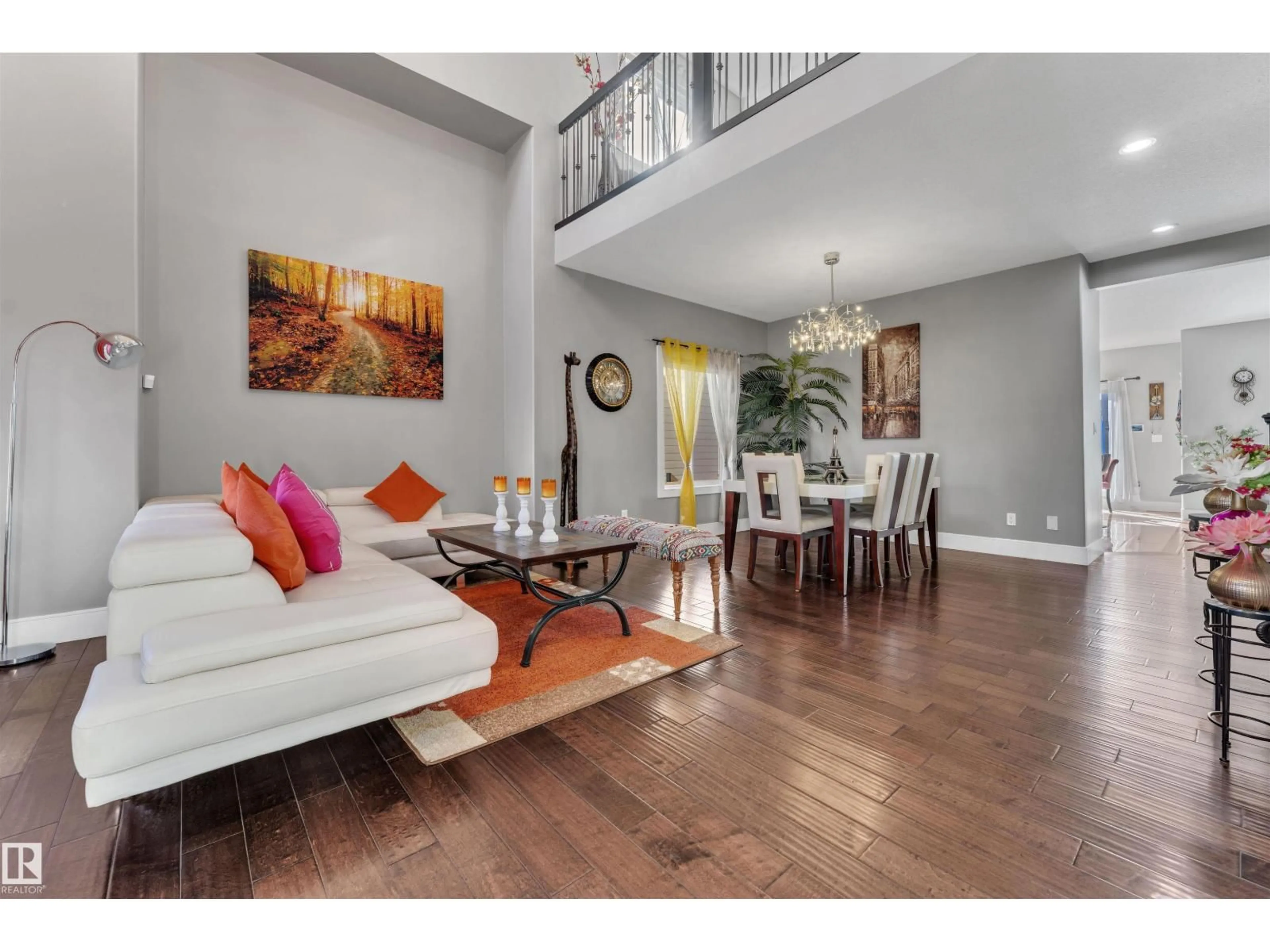 Living room with furniture, wood/laminate floor for 3235 16 AVE, Edmonton Alberta T6T0T8