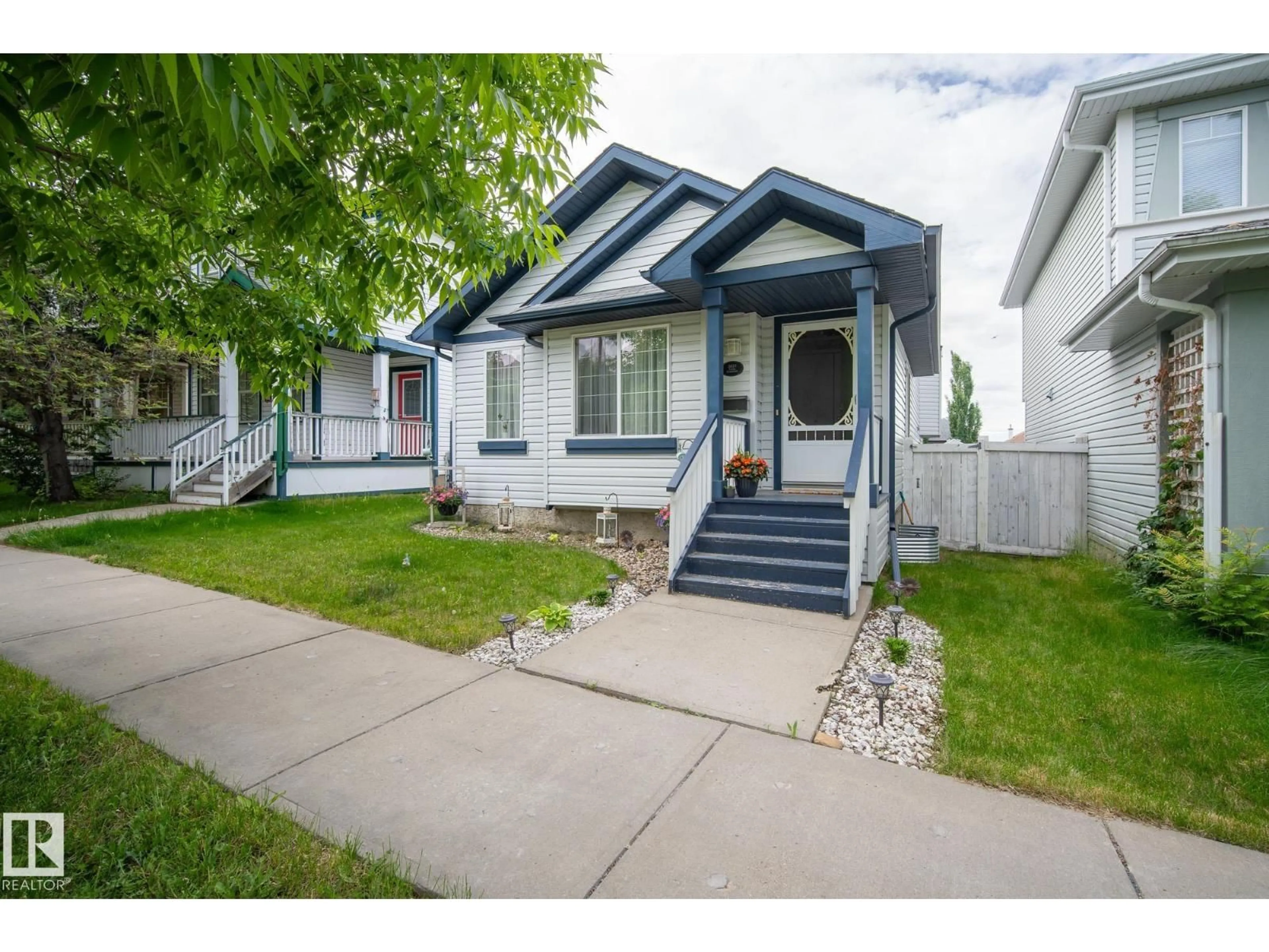 Home with vinyl exterior material, street for 3021 TRELLE CR, Edmonton Alberta T6R3M8