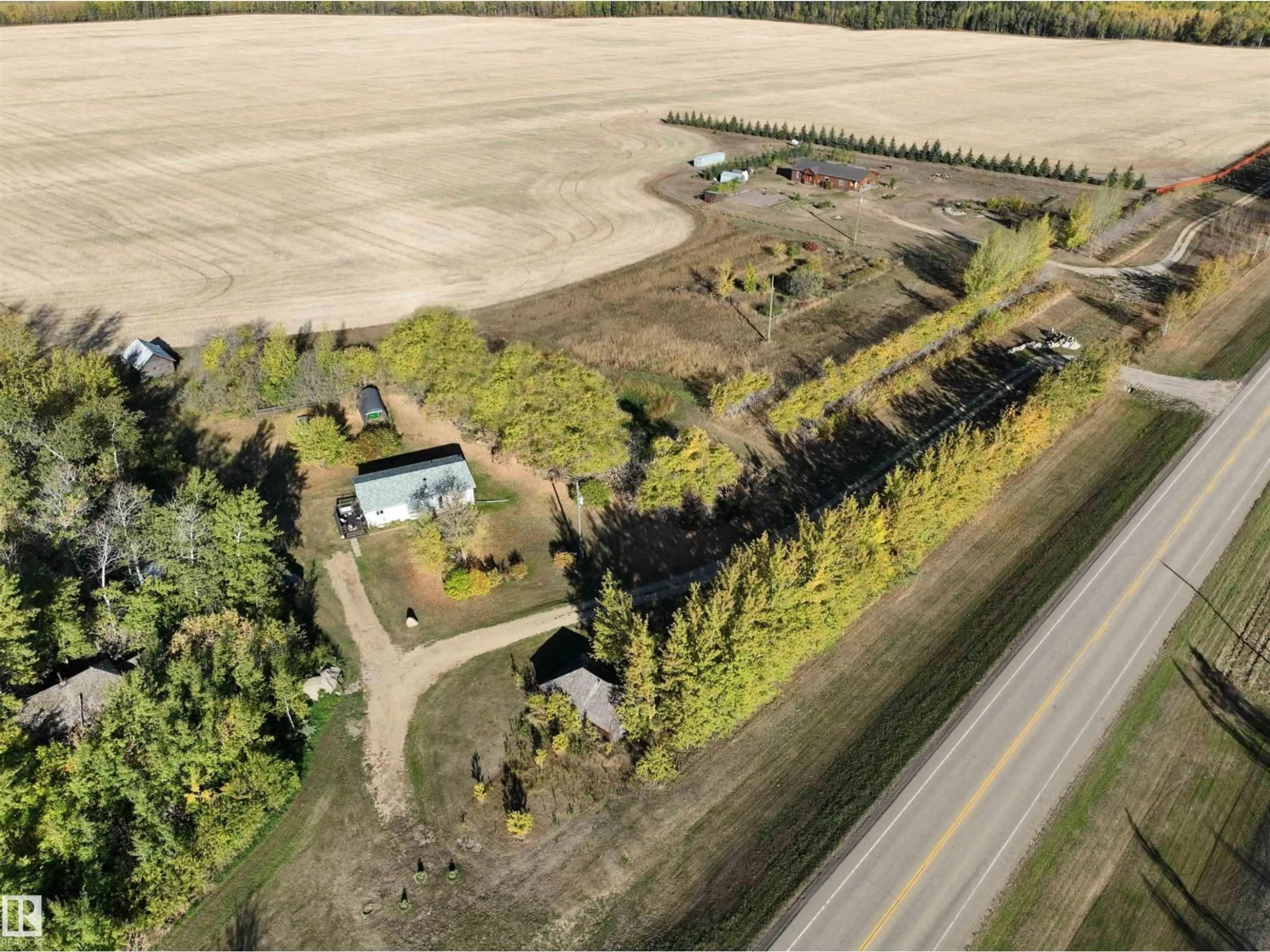 A pic from outside/outdoor area/front of a property/back of a property/a pic from drone, unknown for 660062A HWY 827, Rural Athabasca County Alberta T9S2A9