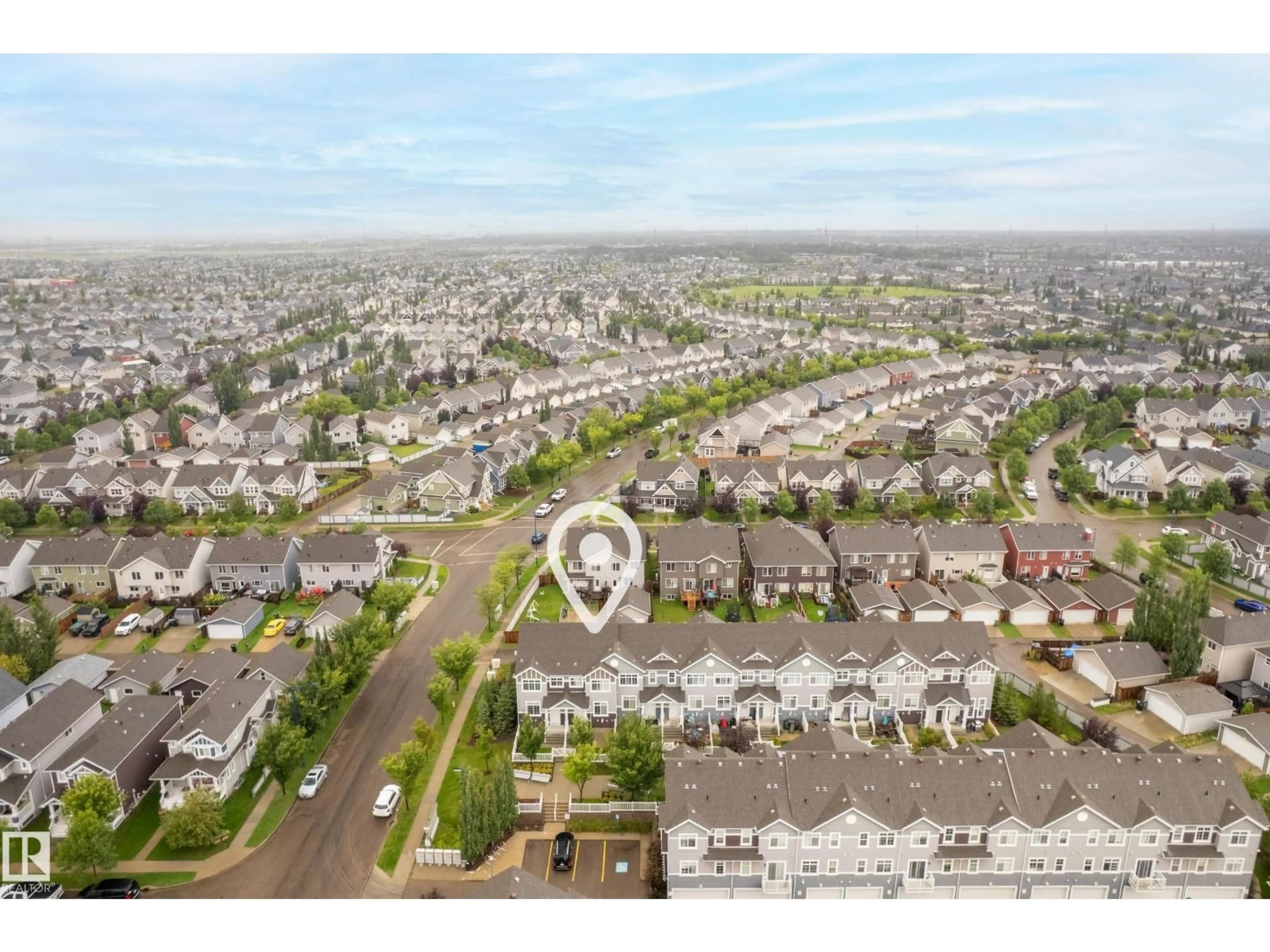 A pic from outside/outdoor area/front of a property/back of a property/a pic from drone, street for #2 - 9151 SHAW WAY SW, Edmonton Alberta T6X1W7