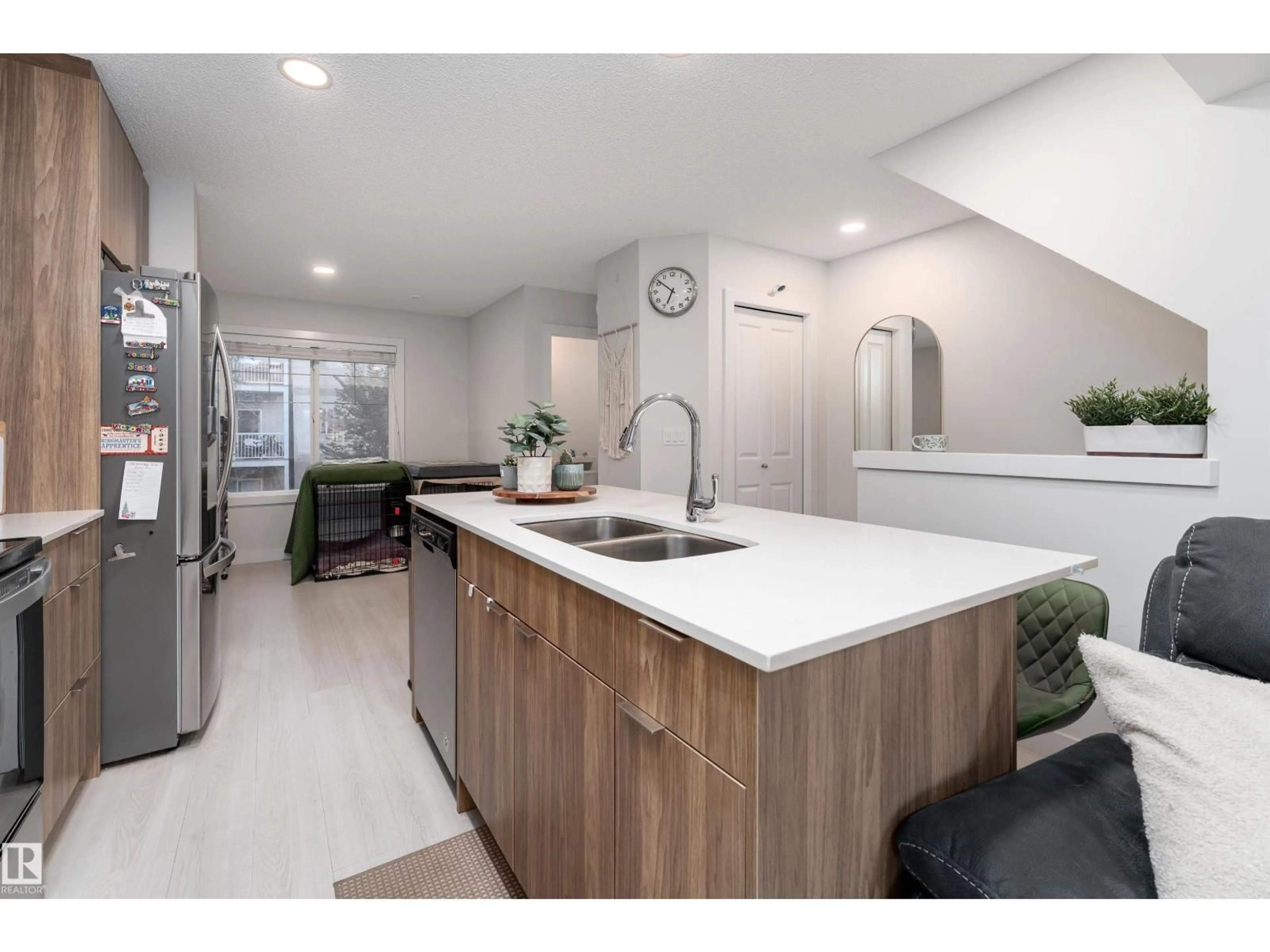 Open concept kitchen, unknown for #47 - 3025 151 AV, Edmonton Alberta T5Y3W4