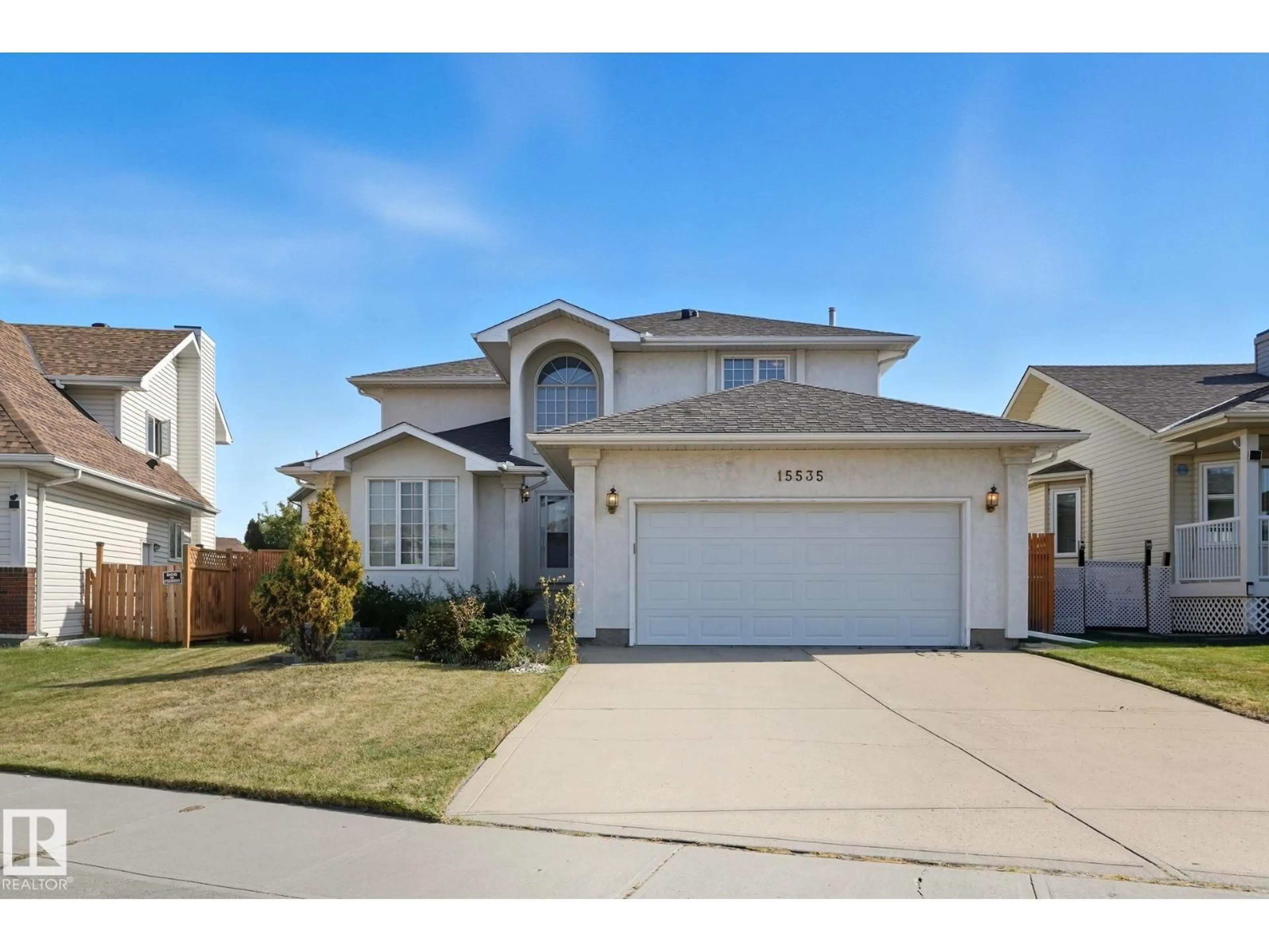 Home with vinyl exterior material, street for 15535 70 ST, Edmonton Alberta T5Z2Y6