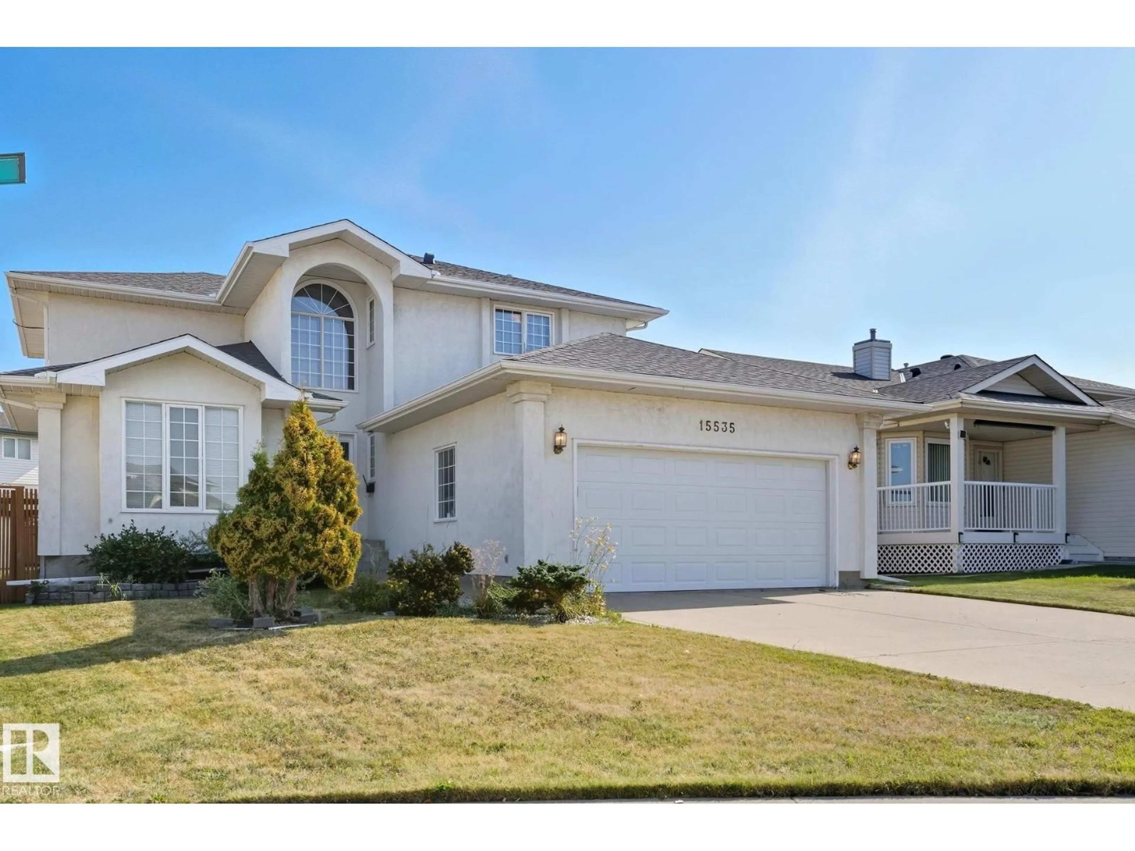 Home with vinyl exterior material, street for 15535 70 ST, Edmonton Alberta T5Z2Y6