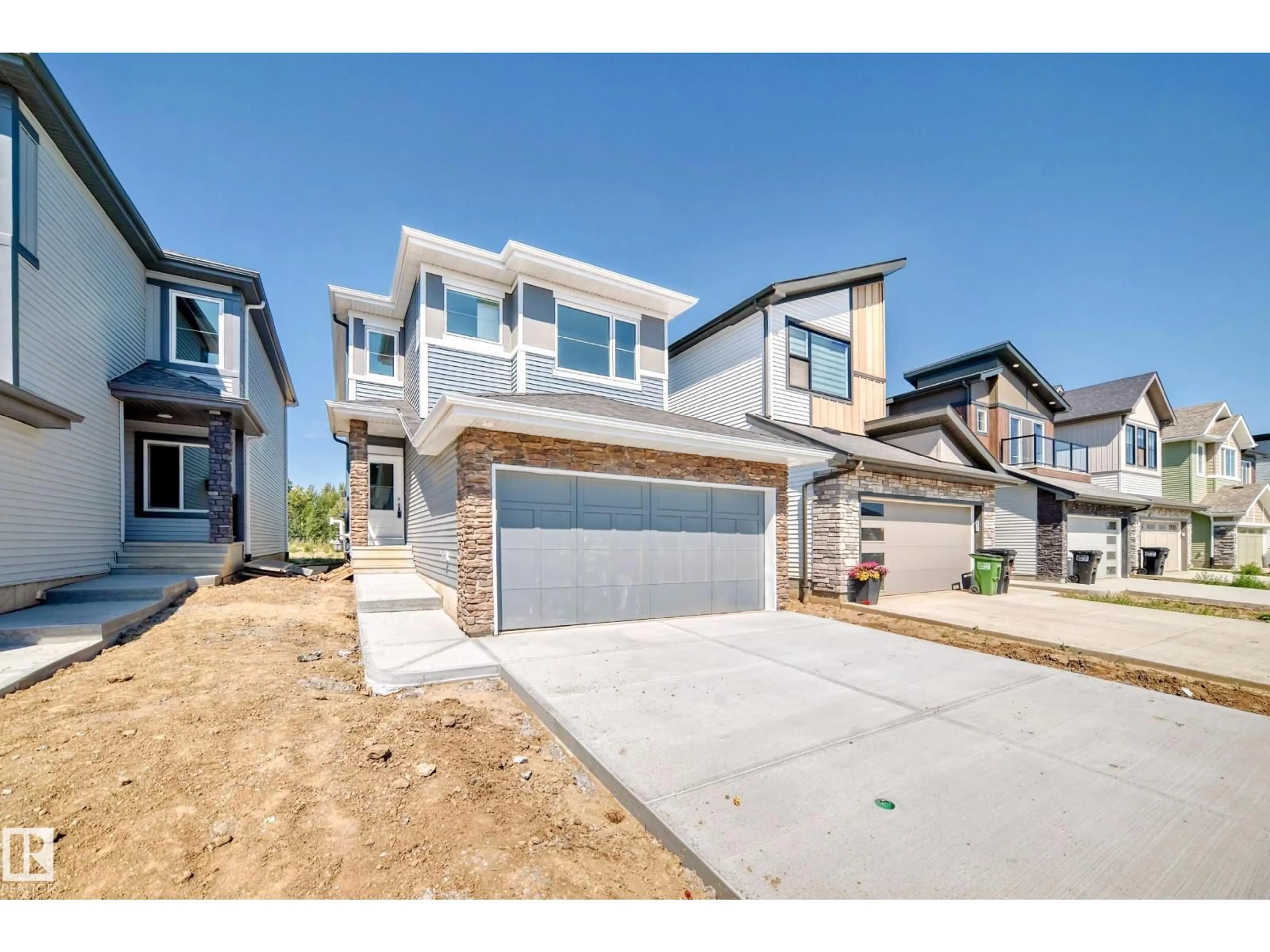 Home with brick exterior material, street for 637 KINGLET BV, Edmonton Alberta T5S0S8