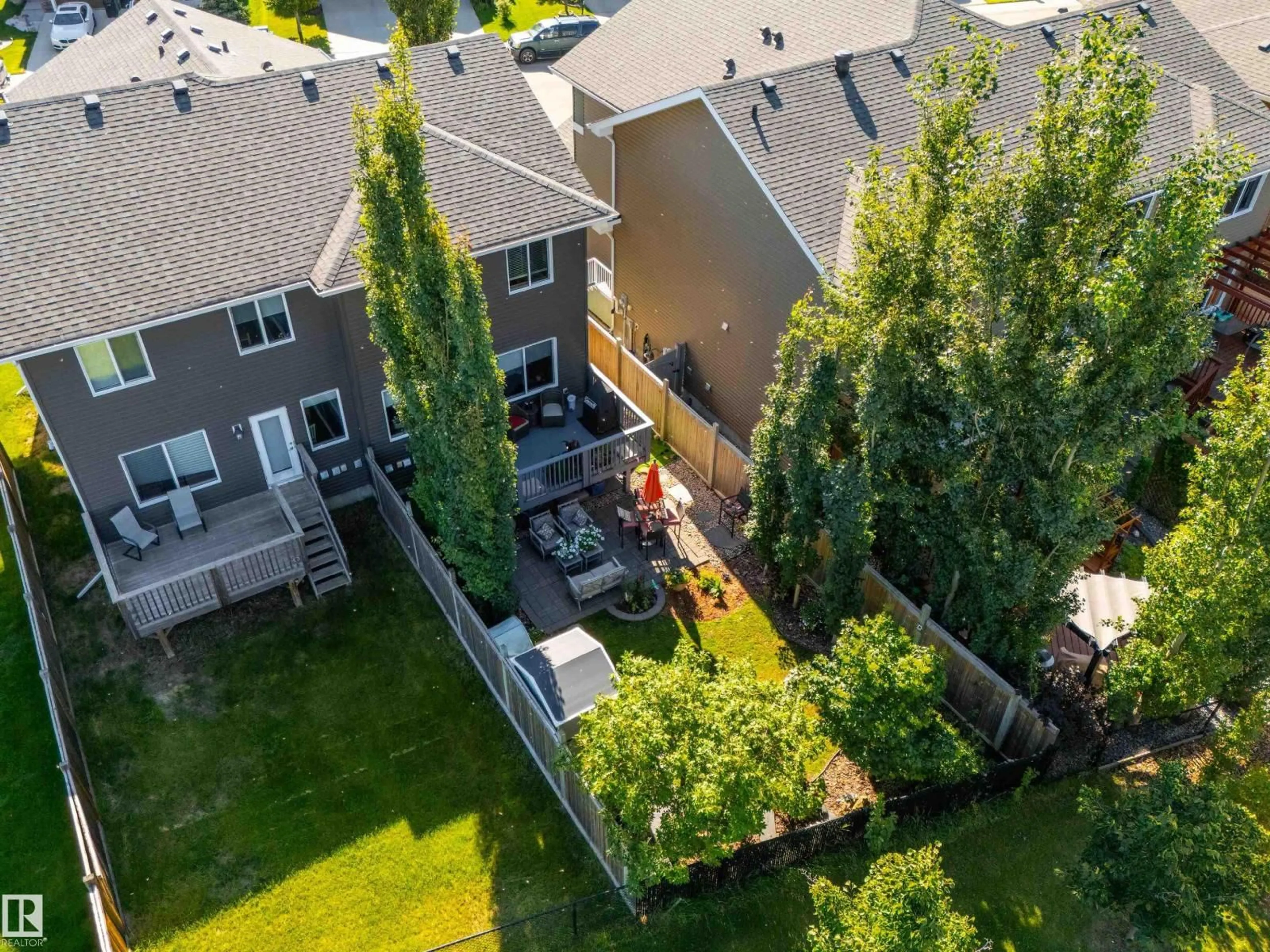 A pic from outside/outdoor area/front of a property/back of a property/a pic from drone, unknown for 136 REED PL, Leduc Alberta T9E1B1