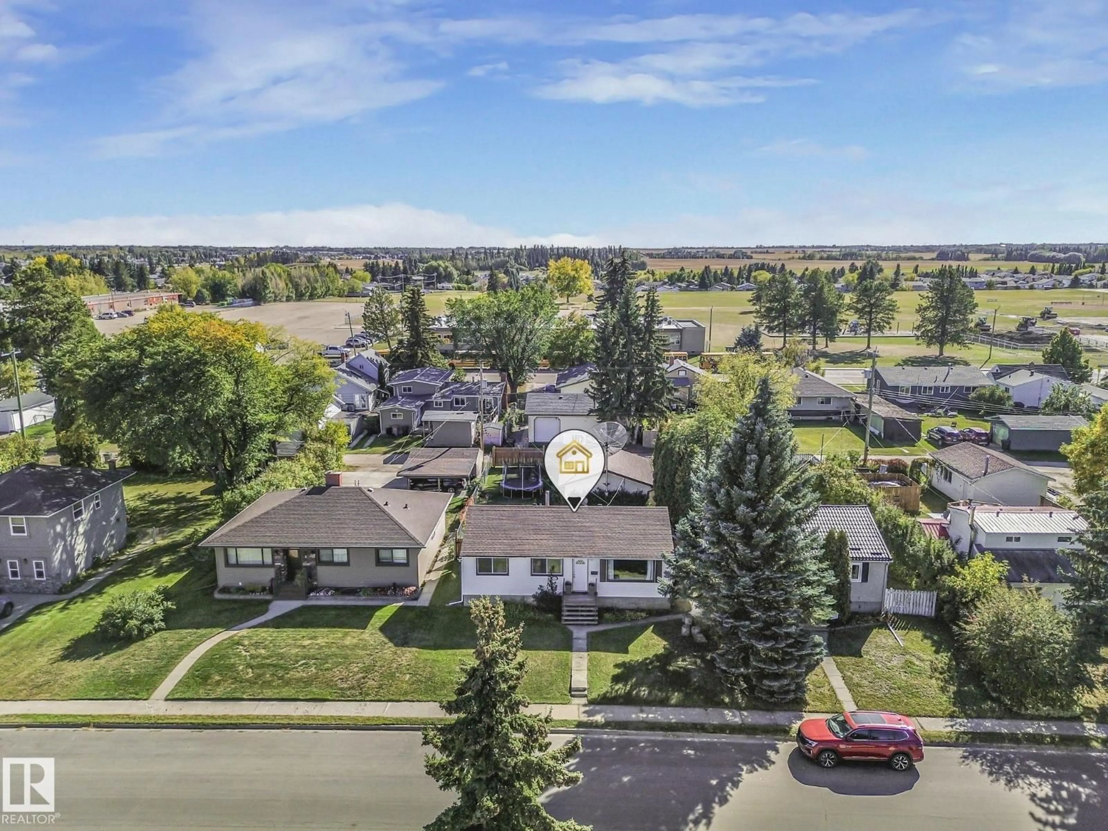 A pic from outside/outdoor area/front of a property/back of a property/a pic from drone, mountain view for 5112 54 AV, Stony Plain Alberta T7Z1B8