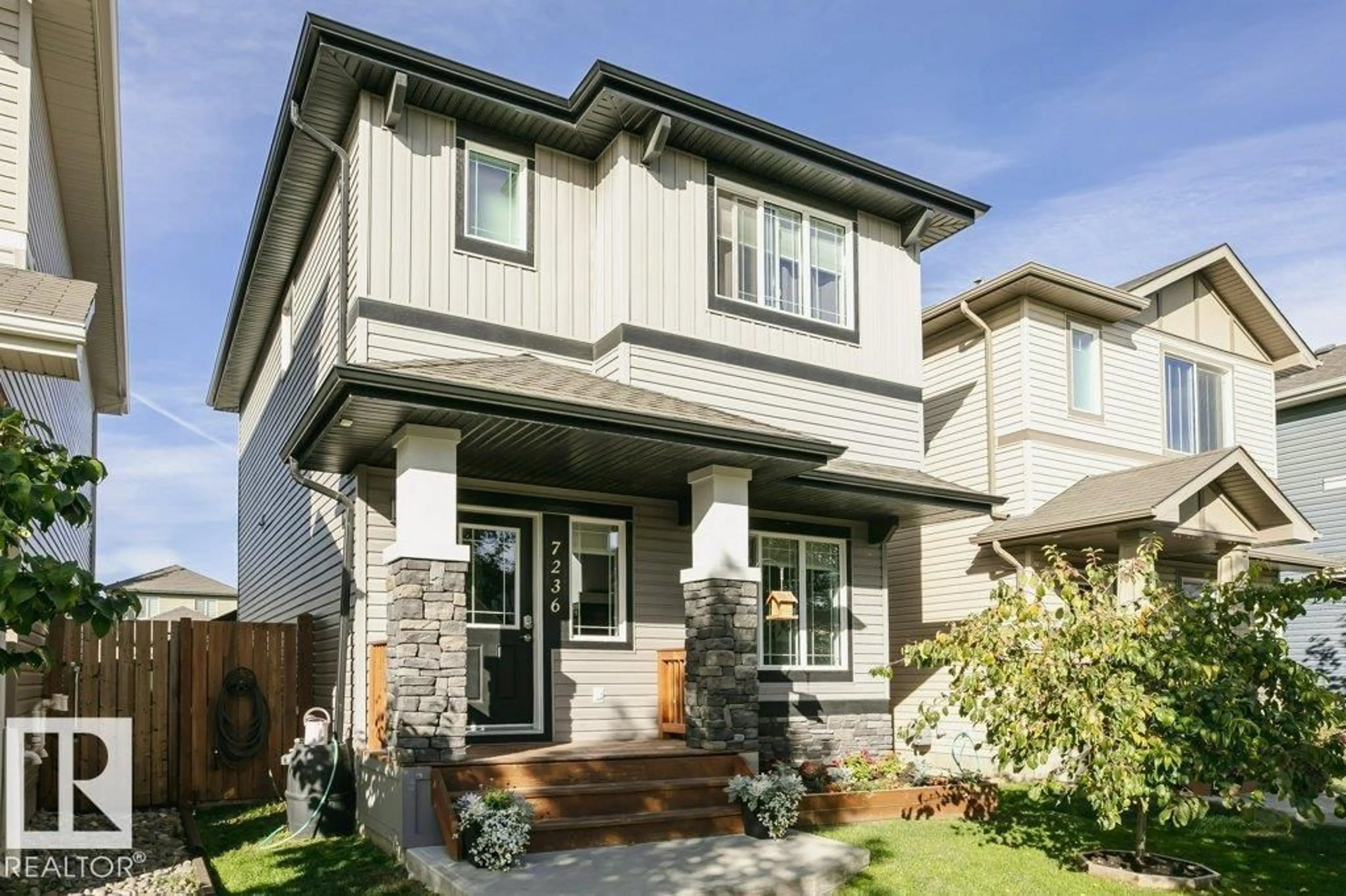 Home with vinyl exterior material, street for SW SW - 7236 ARMOUR CR, Edmonton Alberta T6R2S1