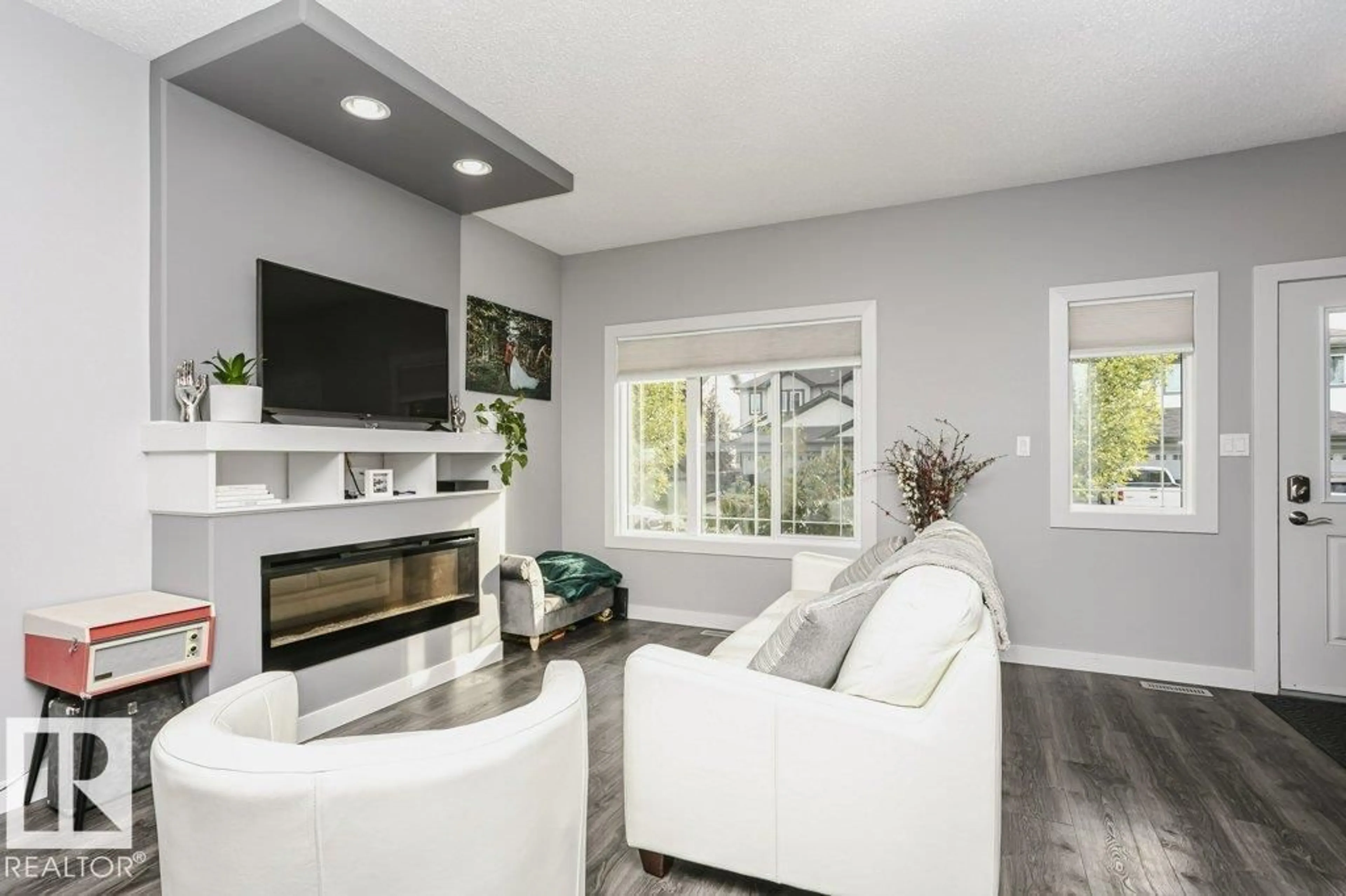Living room with furniture, unknown for SW SW - 7236 ARMOUR CR, Edmonton Alberta T6R2S1