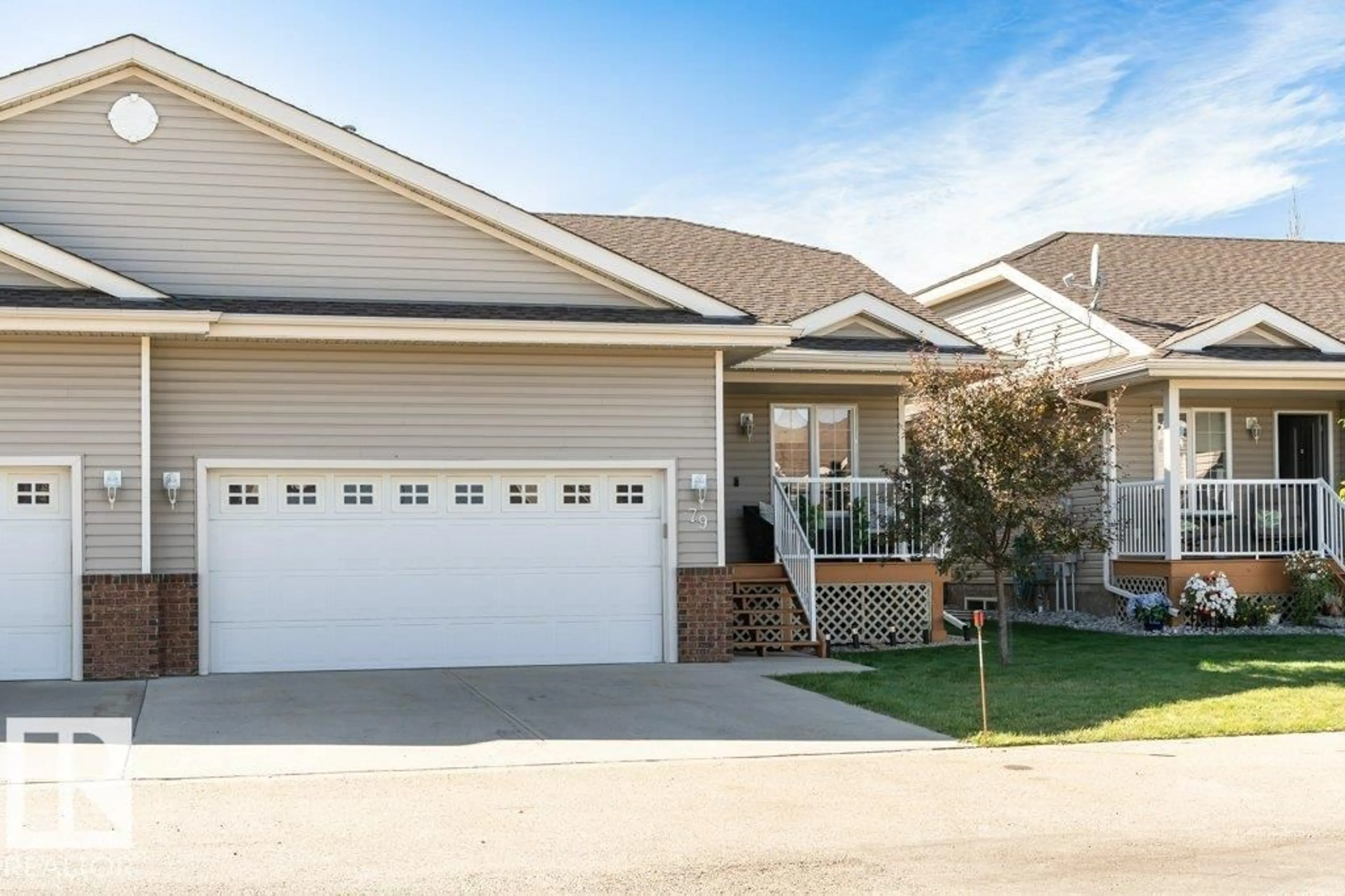 Home with vinyl exterior material, street for 8602 - 79 SOUTHFORT DR, Fort Saskatchewan Alberta T8L4R7