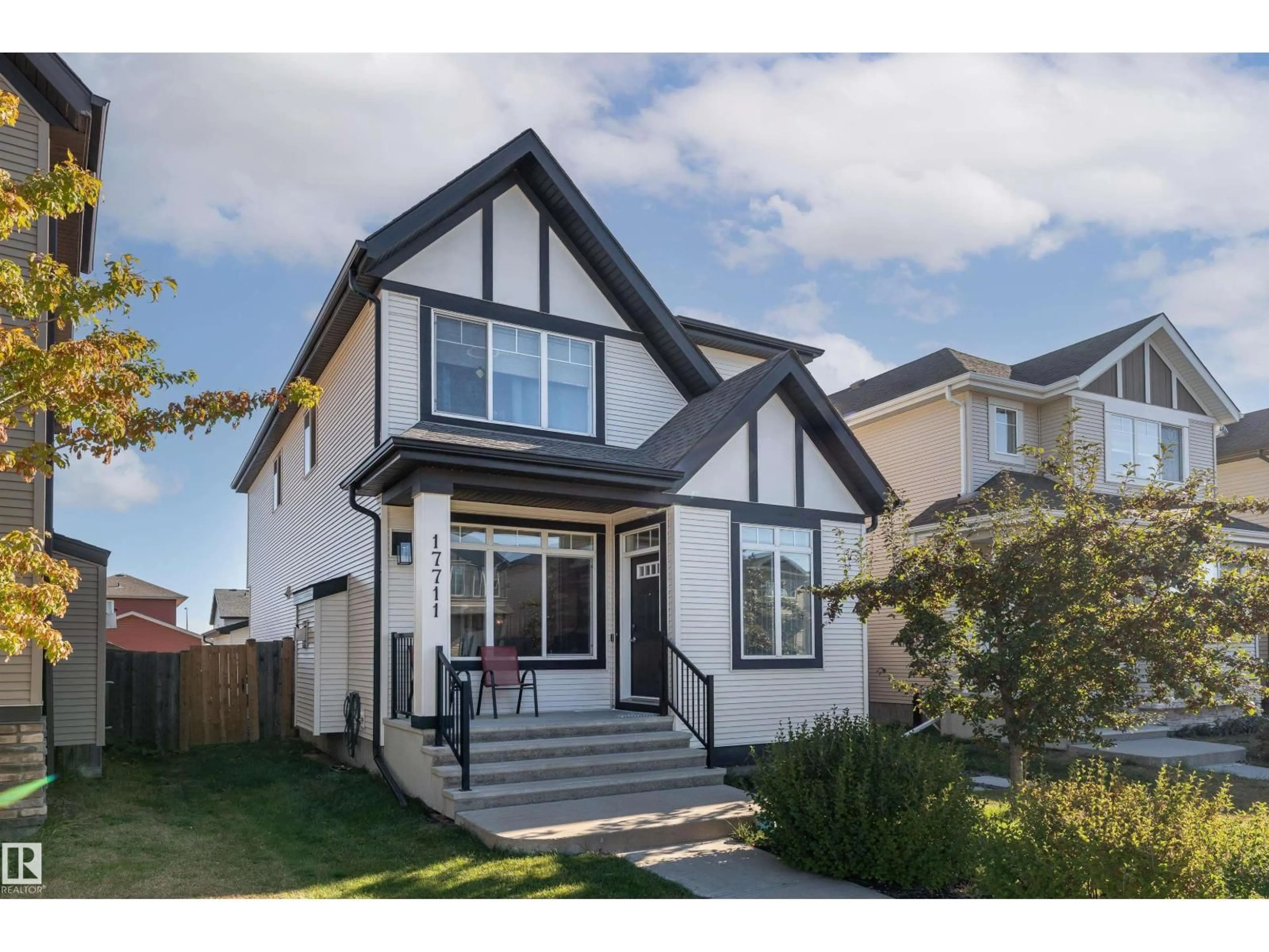 Home with vinyl exterior material, street for NW - 17711 59 ST, Edmonton Alberta T5Y0W8