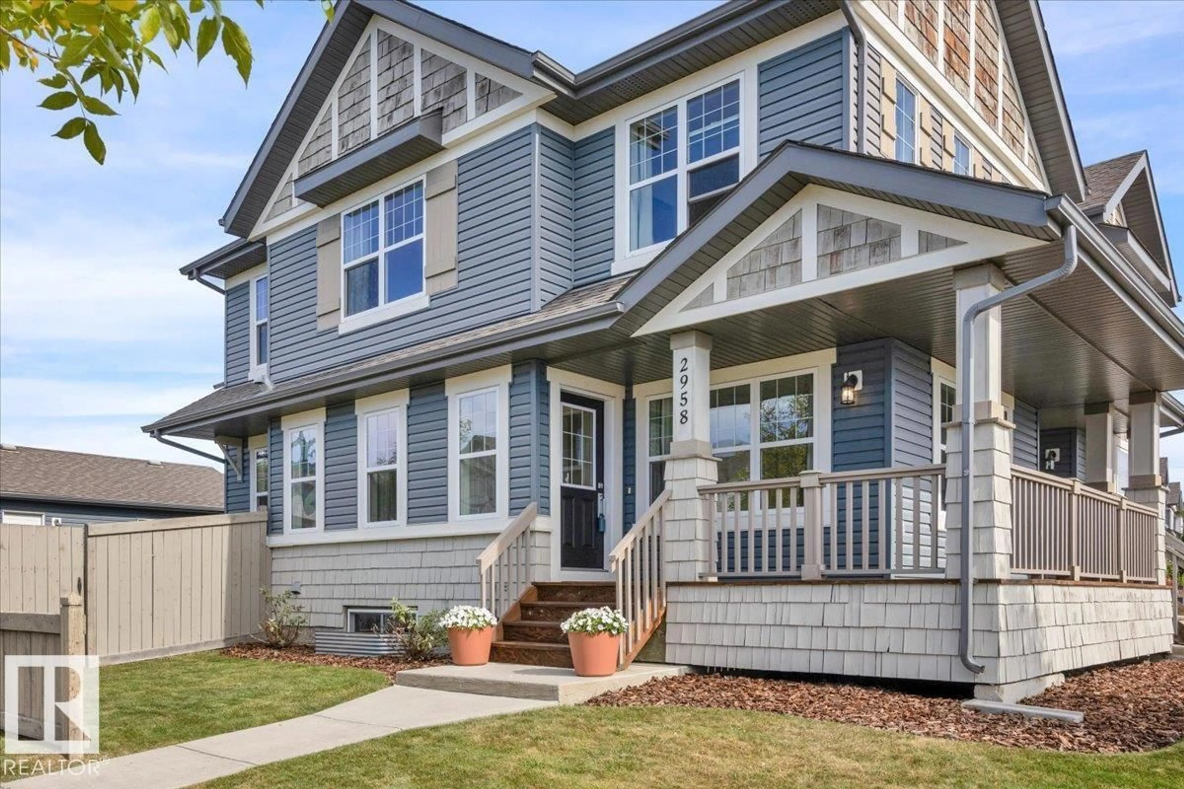 Home with vinyl exterior material, street for 2958 18A AV, Edmonton Alberta T6T0N7