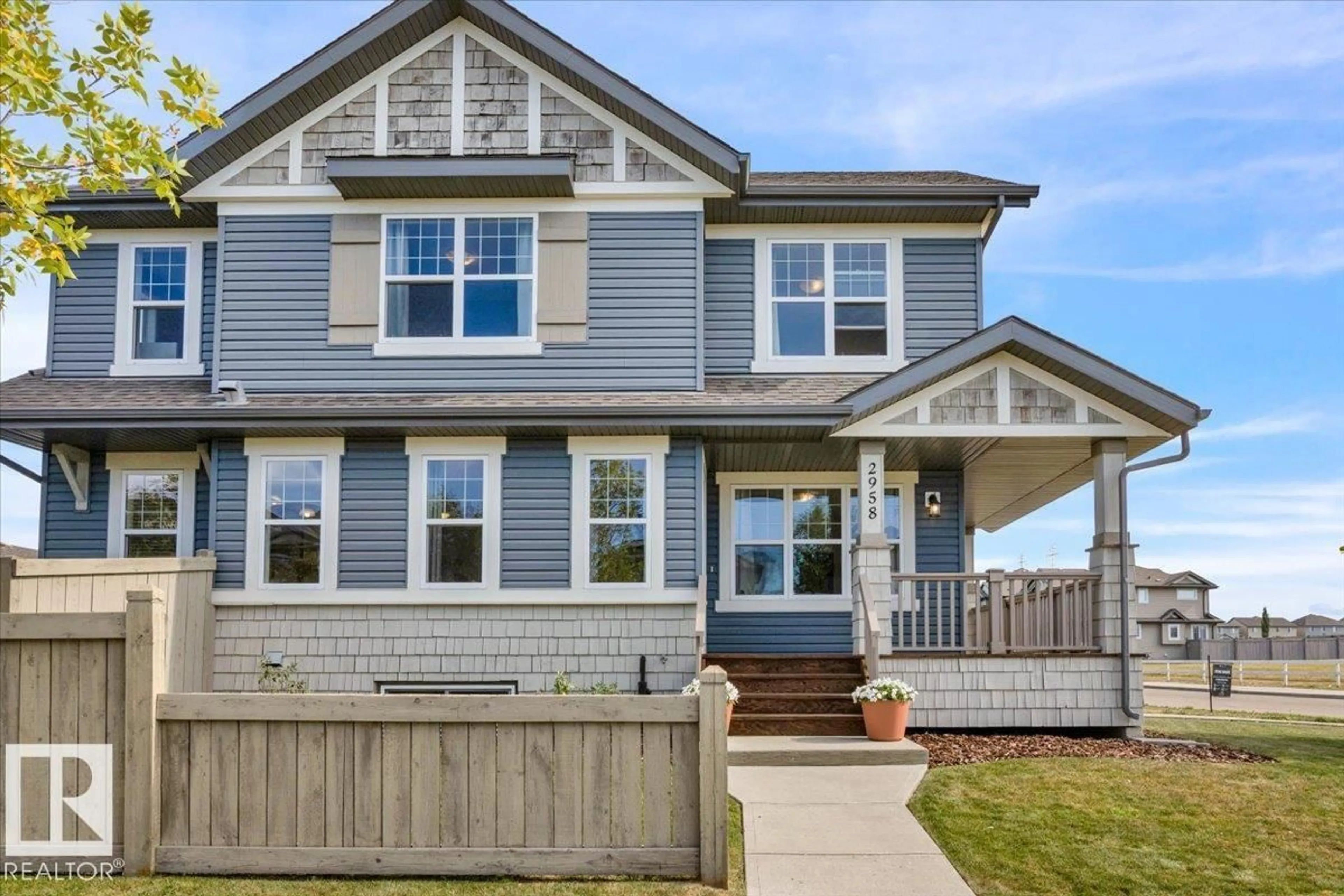 Home with vinyl exterior material, street for 2958 18A AV, Edmonton Alberta T6T0N7