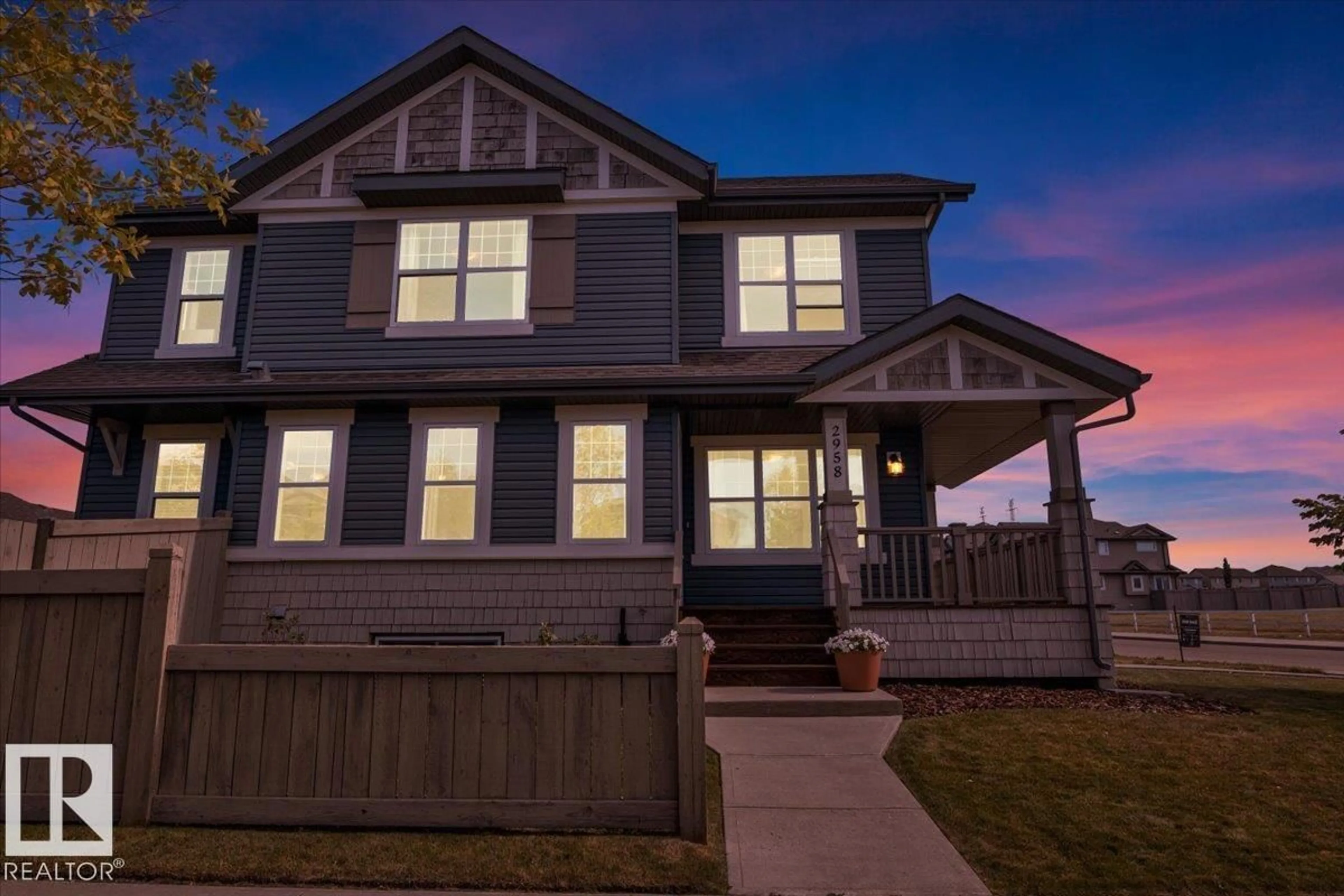 Home with vinyl exterior material, street for 2958 18A AV, Edmonton Alberta T6T0N7