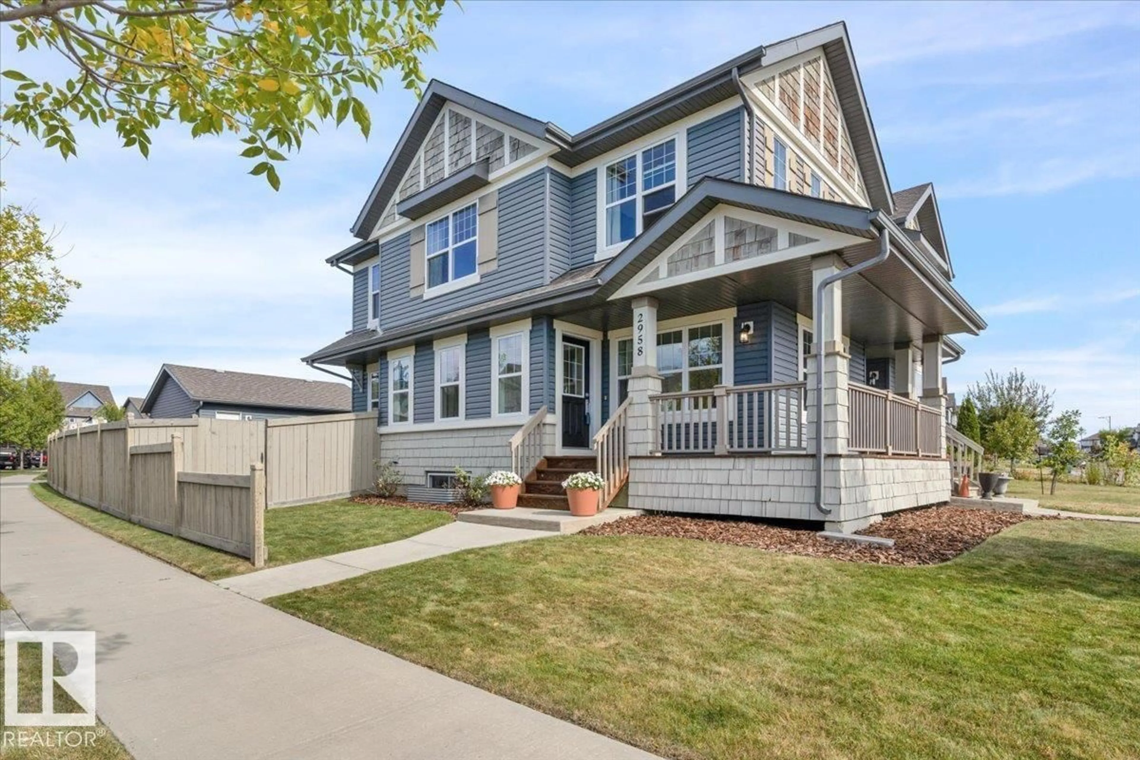 Home with vinyl exterior material, street for 2958 18A AV, Edmonton Alberta T6T0N7