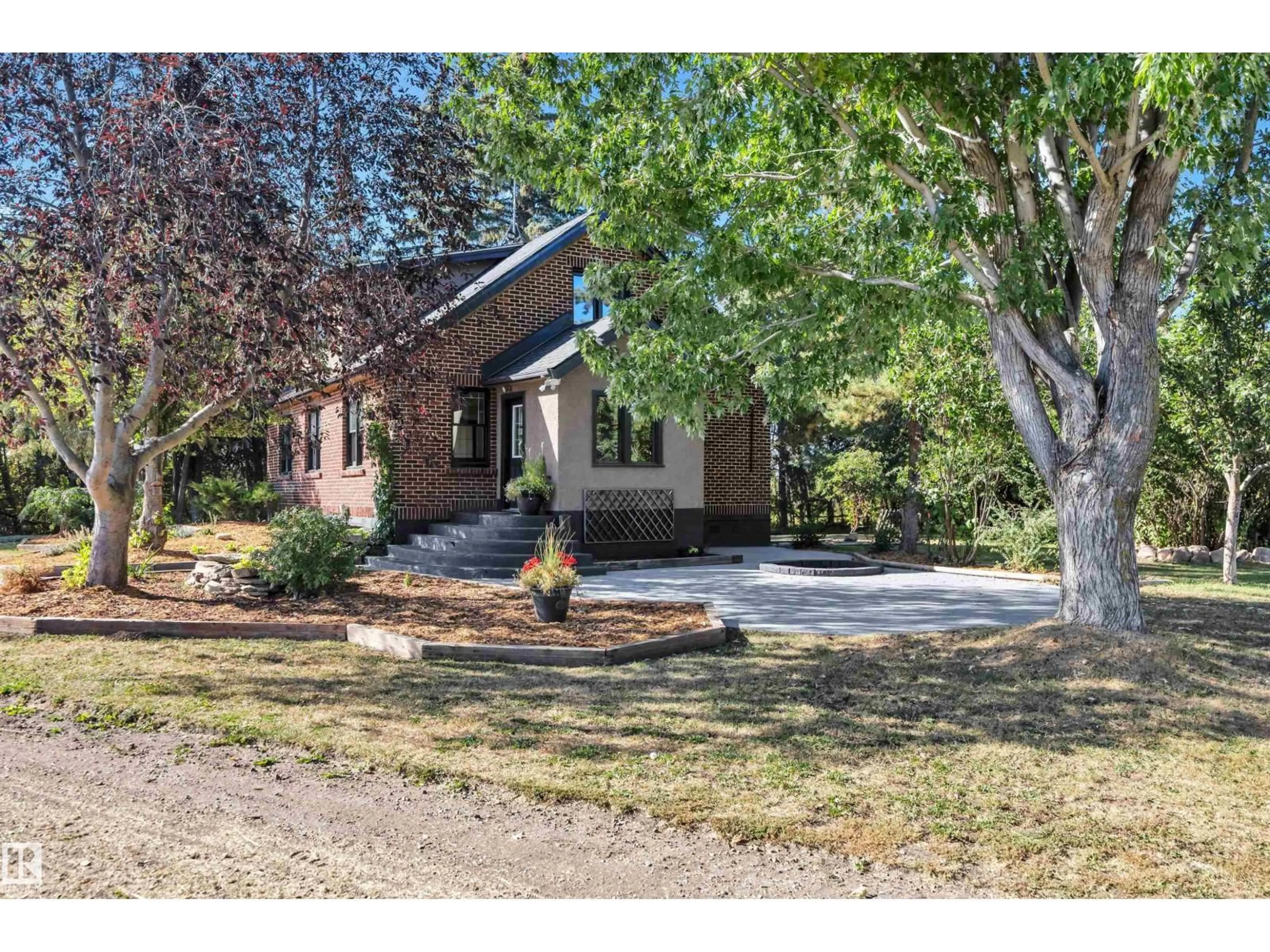 Home with brick exterior material, street for 473025 RANGE ROAD 262, Rural Wetaskiwin County Alberta T4N2A3