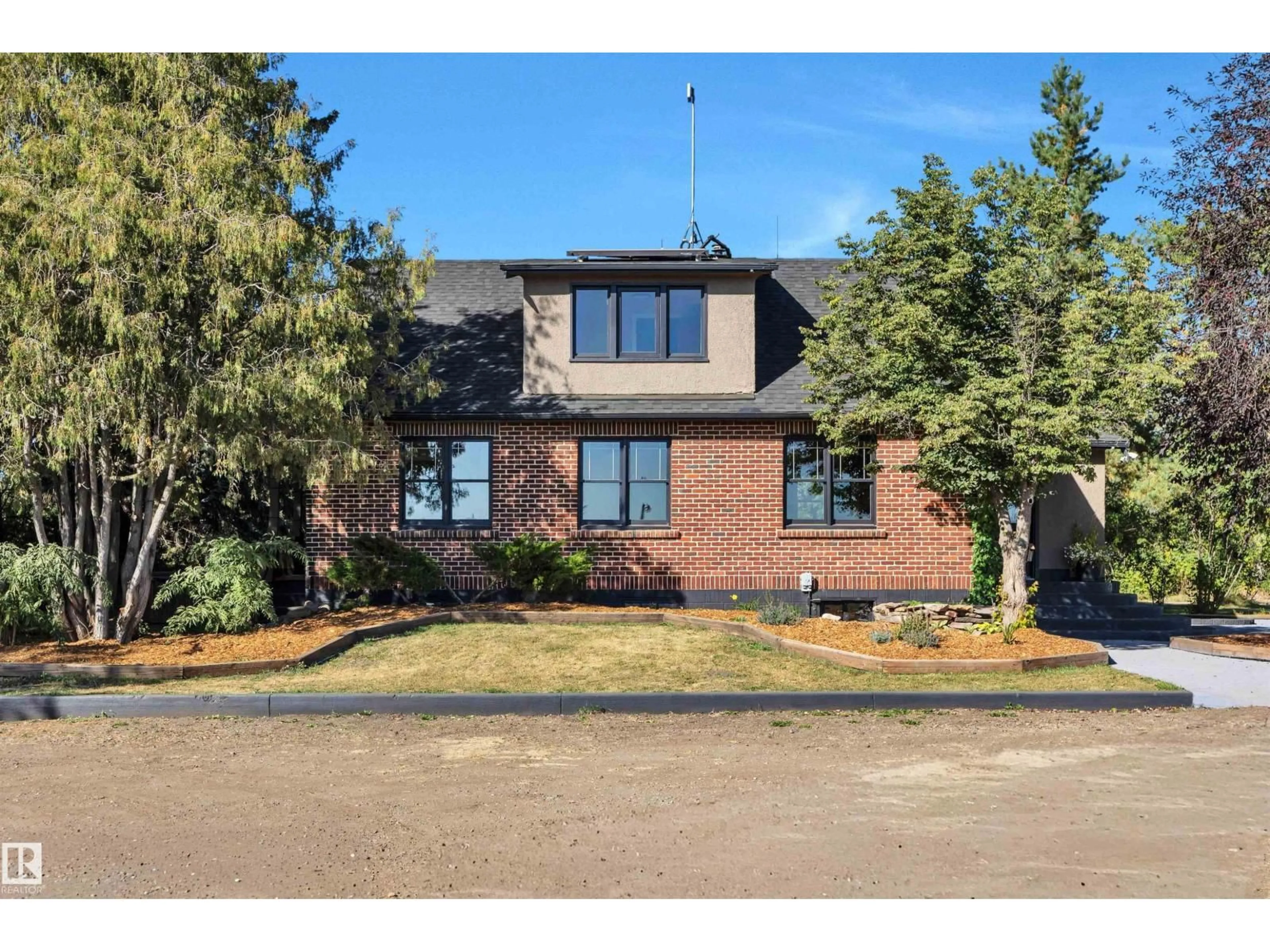 Home with brick exterior material, street for 473025 RANGE ROAD 262, Rural Wetaskiwin County Alberta T4N2A3
