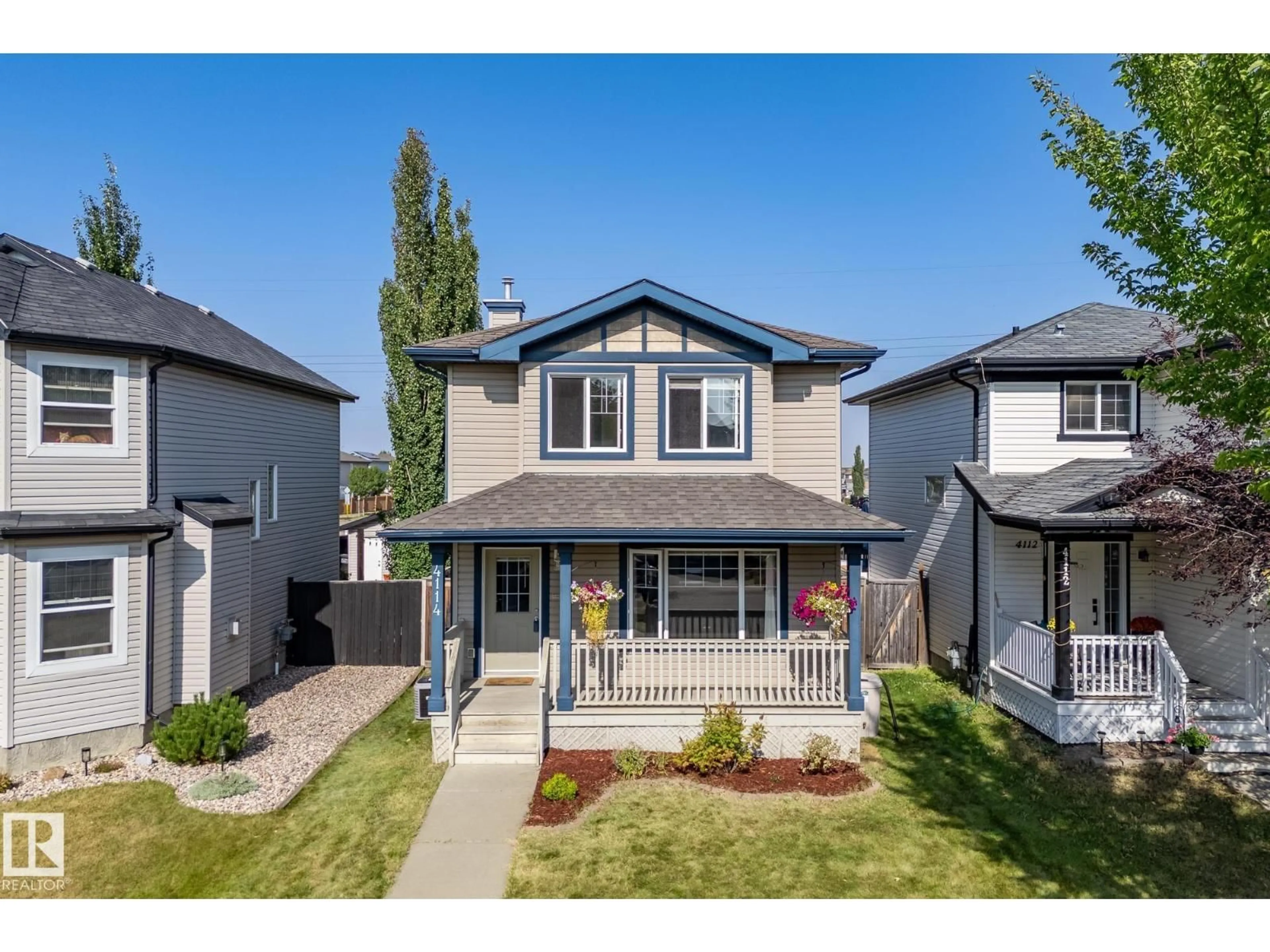 Home with vinyl exterior material, street for 4114 158 AV, Edmonton Alberta T5Y0A3