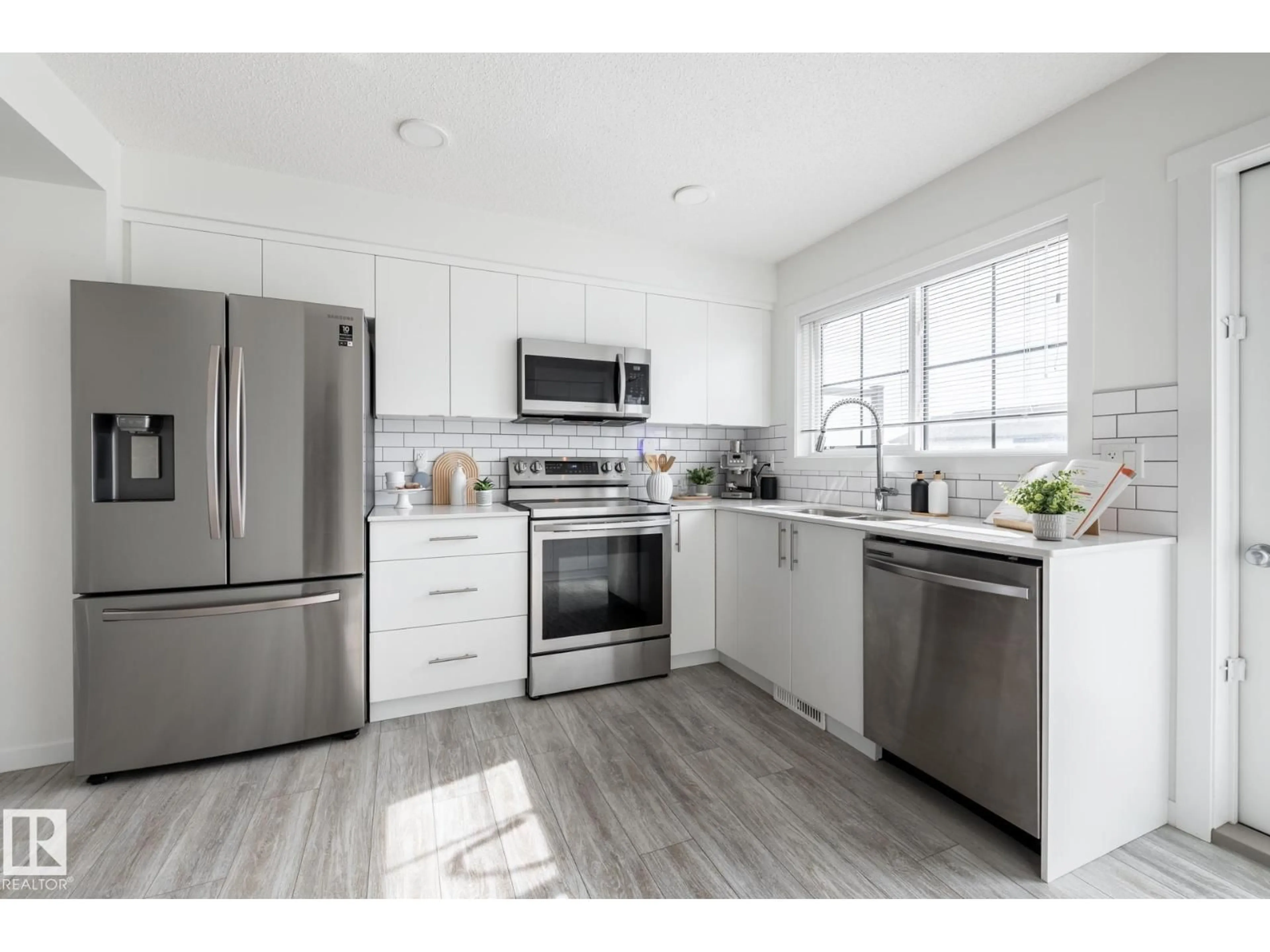 Open concept kitchen, unknown for 19216 27 AV, Edmonton Alberta T6M1L1