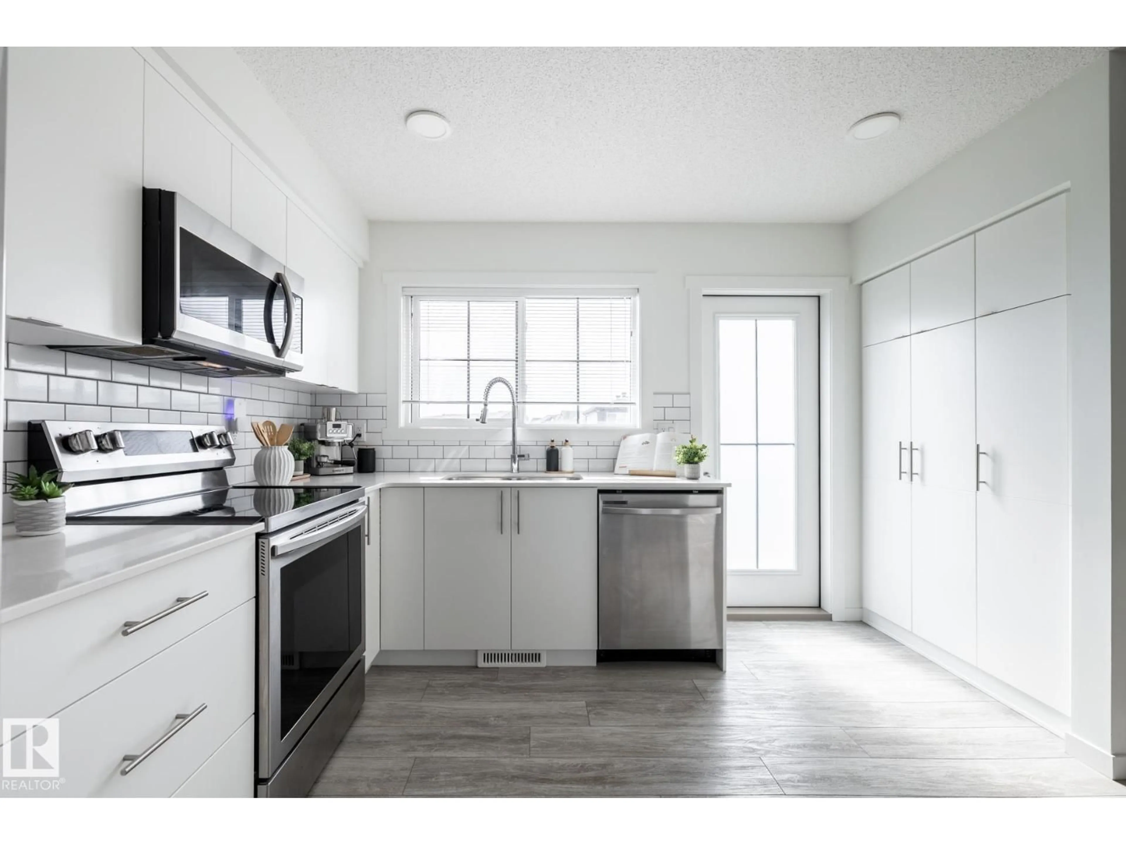 Open concept kitchen, unknown for 19216 27 AV, Edmonton Alberta T6M1L1