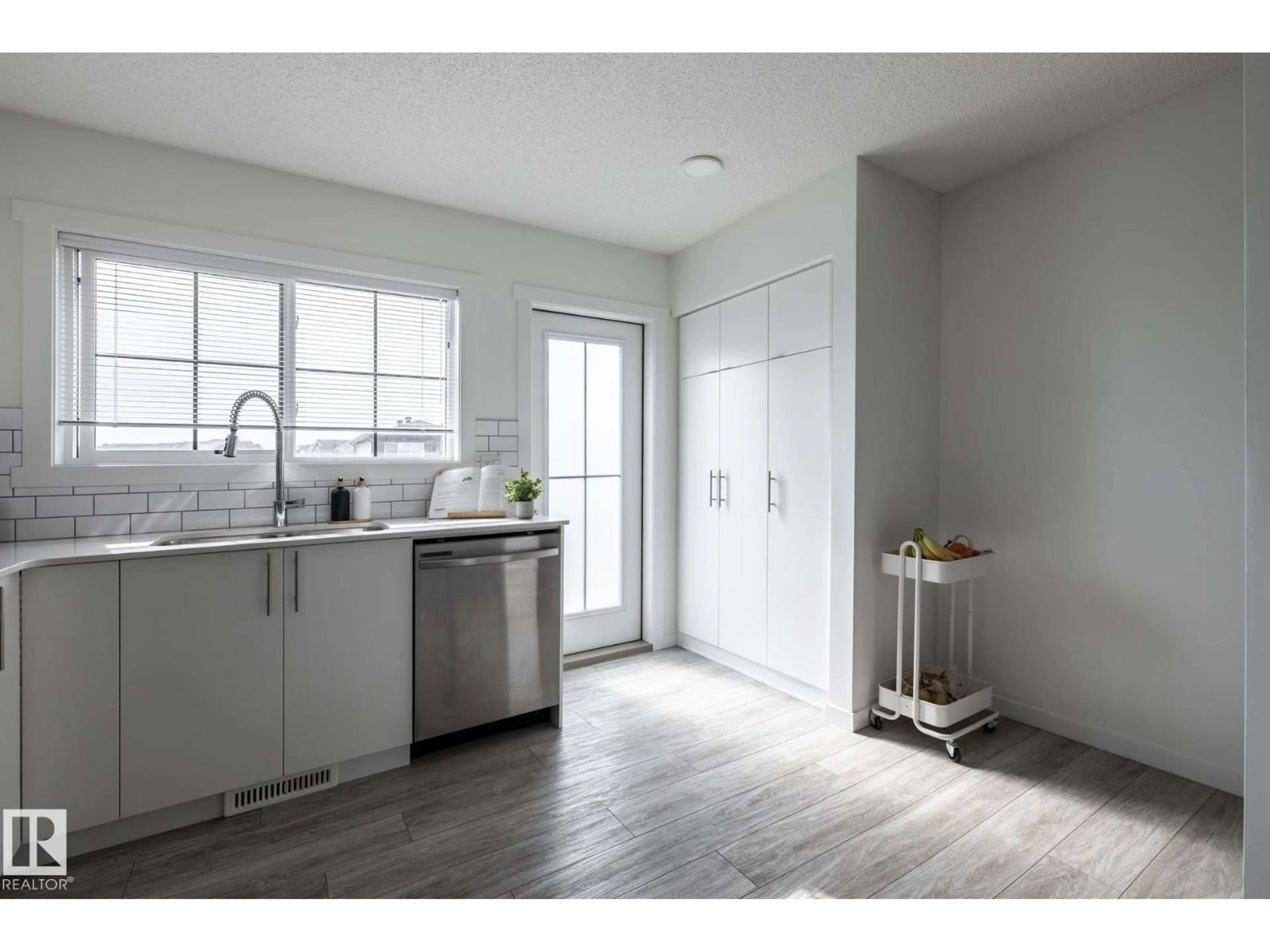 Open concept kitchen, unknown for 19216 27 AV, Edmonton Alberta T6M1L1