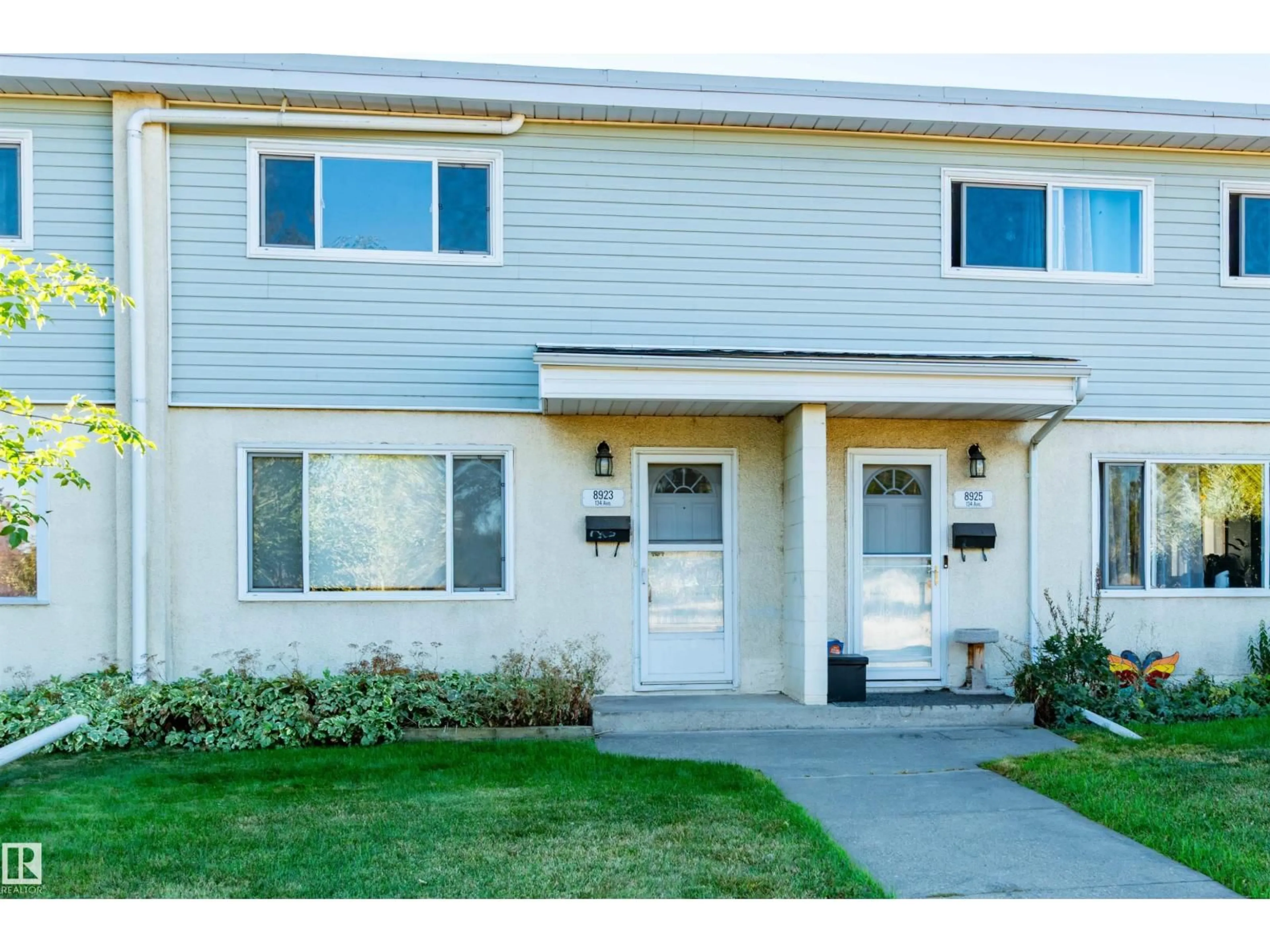 Home with vinyl exterior material, street for 8923 134 AV, Edmonton Alberta T5E1H3