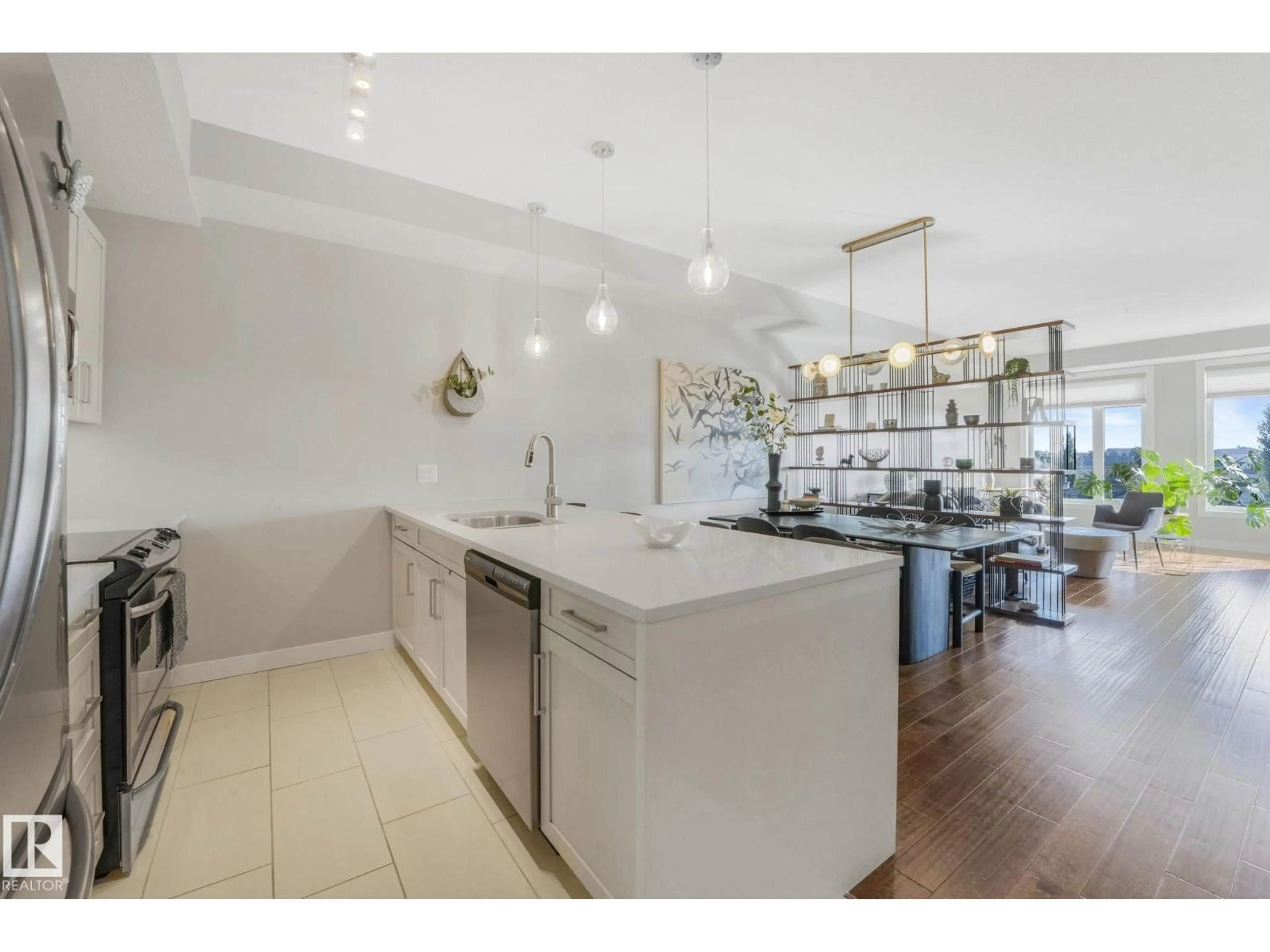 Open concept kitchen, ceramic/tile floor for #409 - 625 LEGER WY, Edmonton Alberta T6R0W4