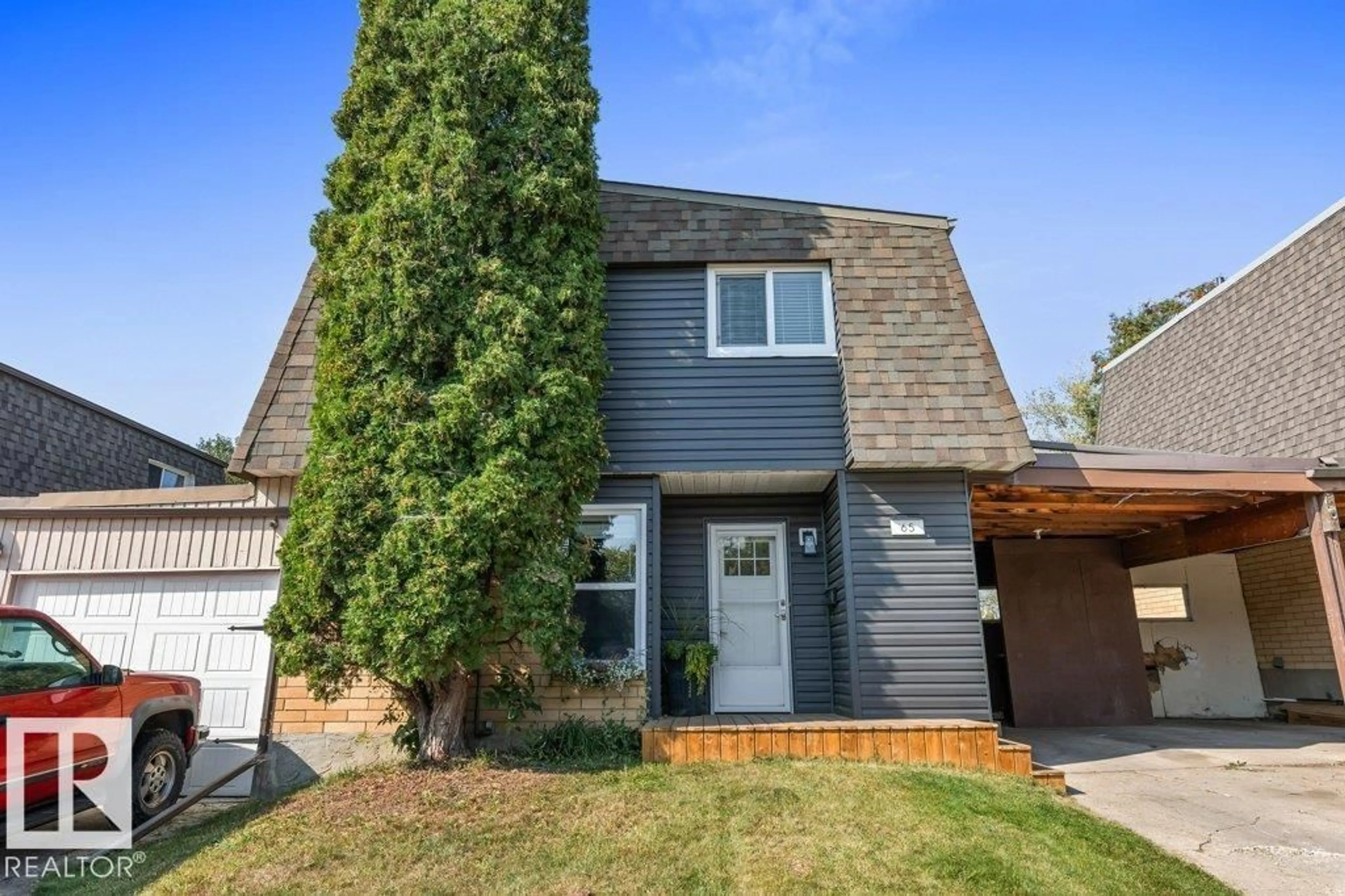 Home with vinyl exterior material, street for 65 GREENFIELD ES, St. Albert Alberta T8N2G2