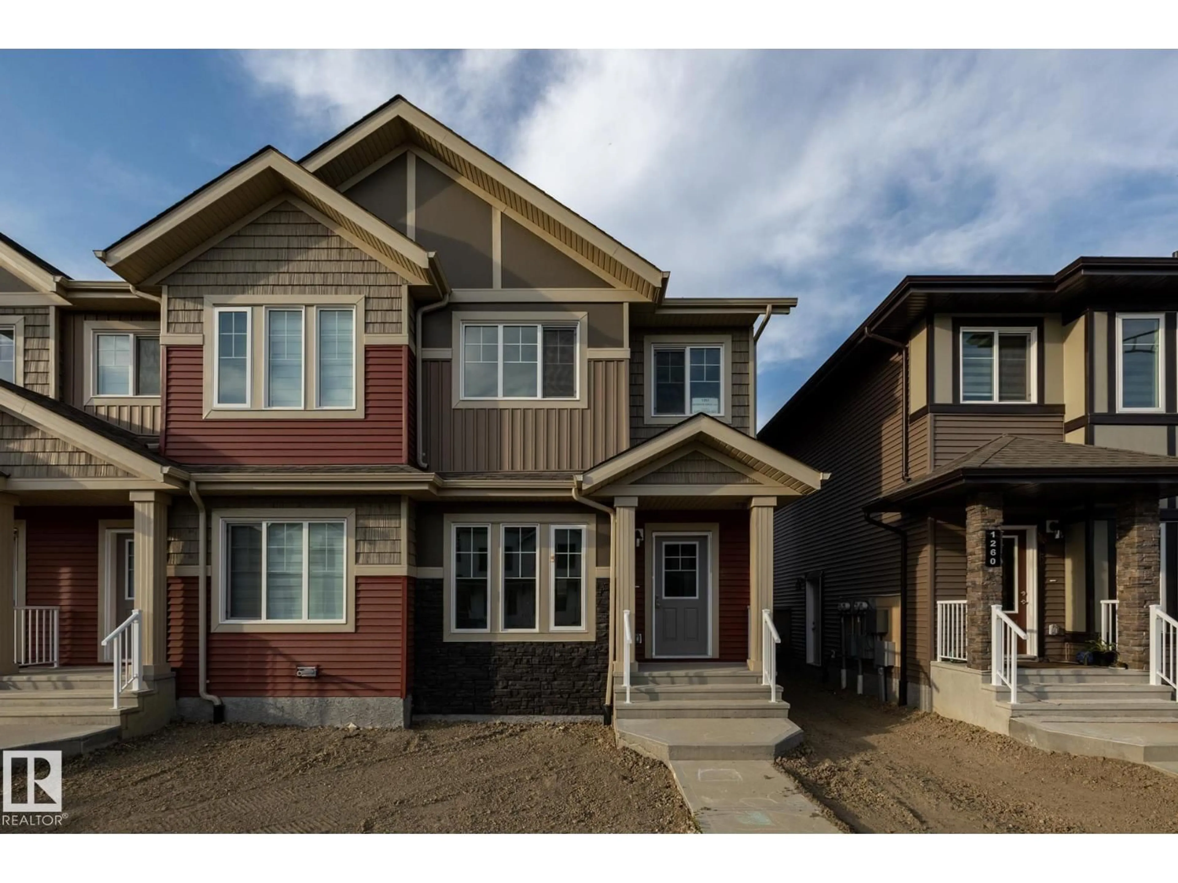 Home with vinyl exterior material, street for 1262 KESWICK DR, Edmonton Alberta T6W5P2