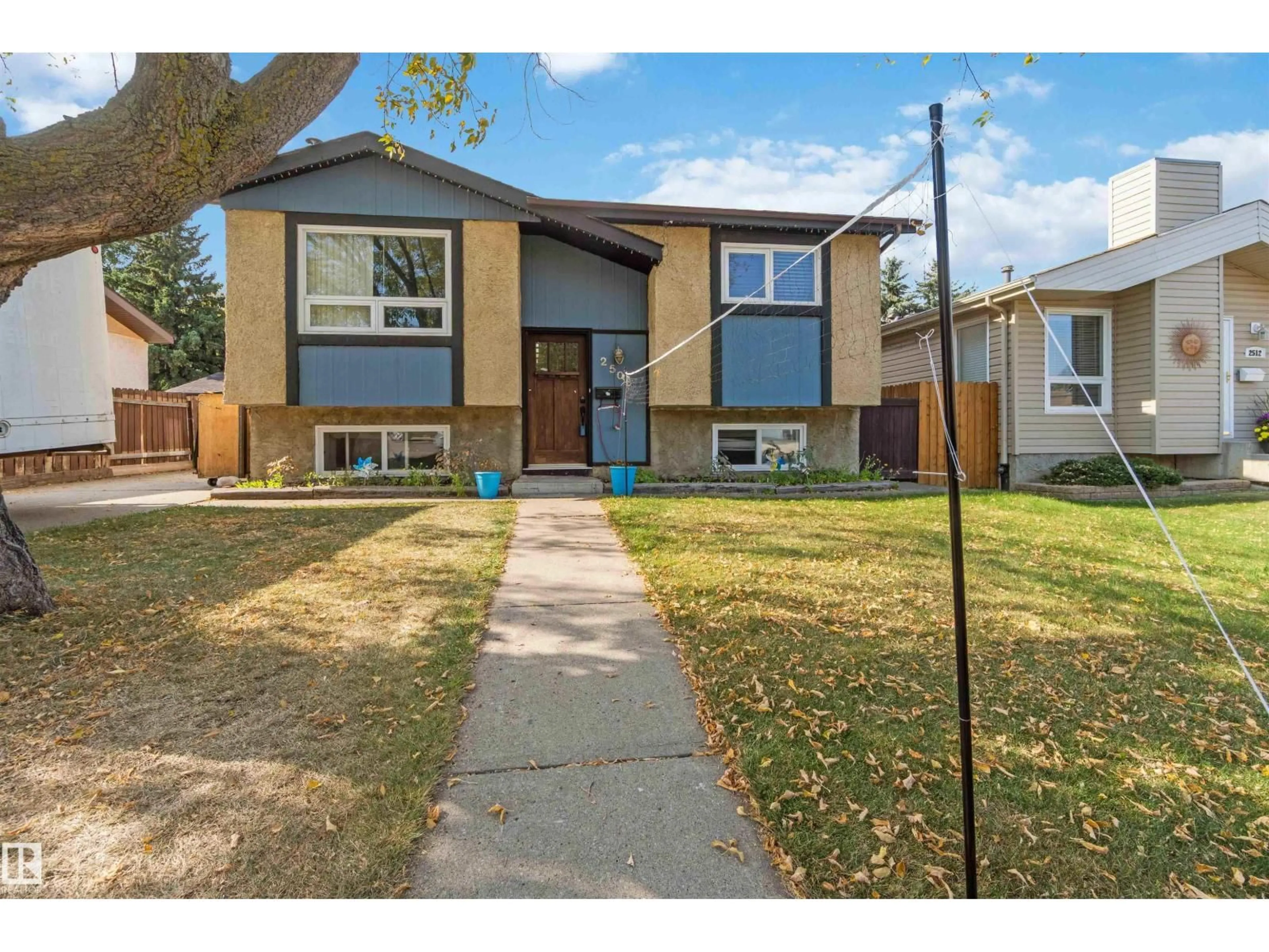 Home with vinyl exterior material, street for 2508 49 ST, Edmonton Alberta T6L3W9