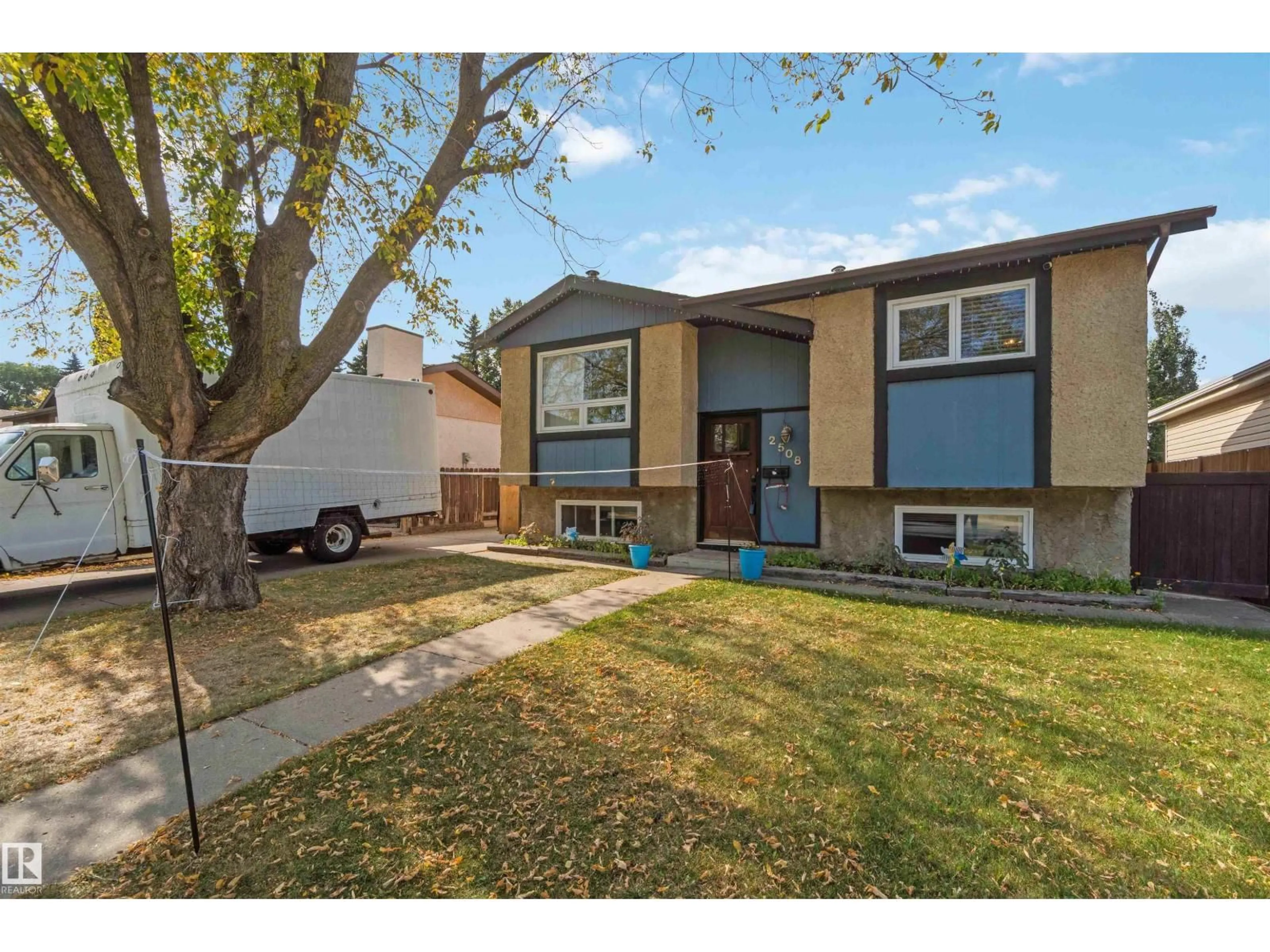Home with vinyl exterior material, street for 2508 49 ST, Edmonton Alberta T6L3W9
